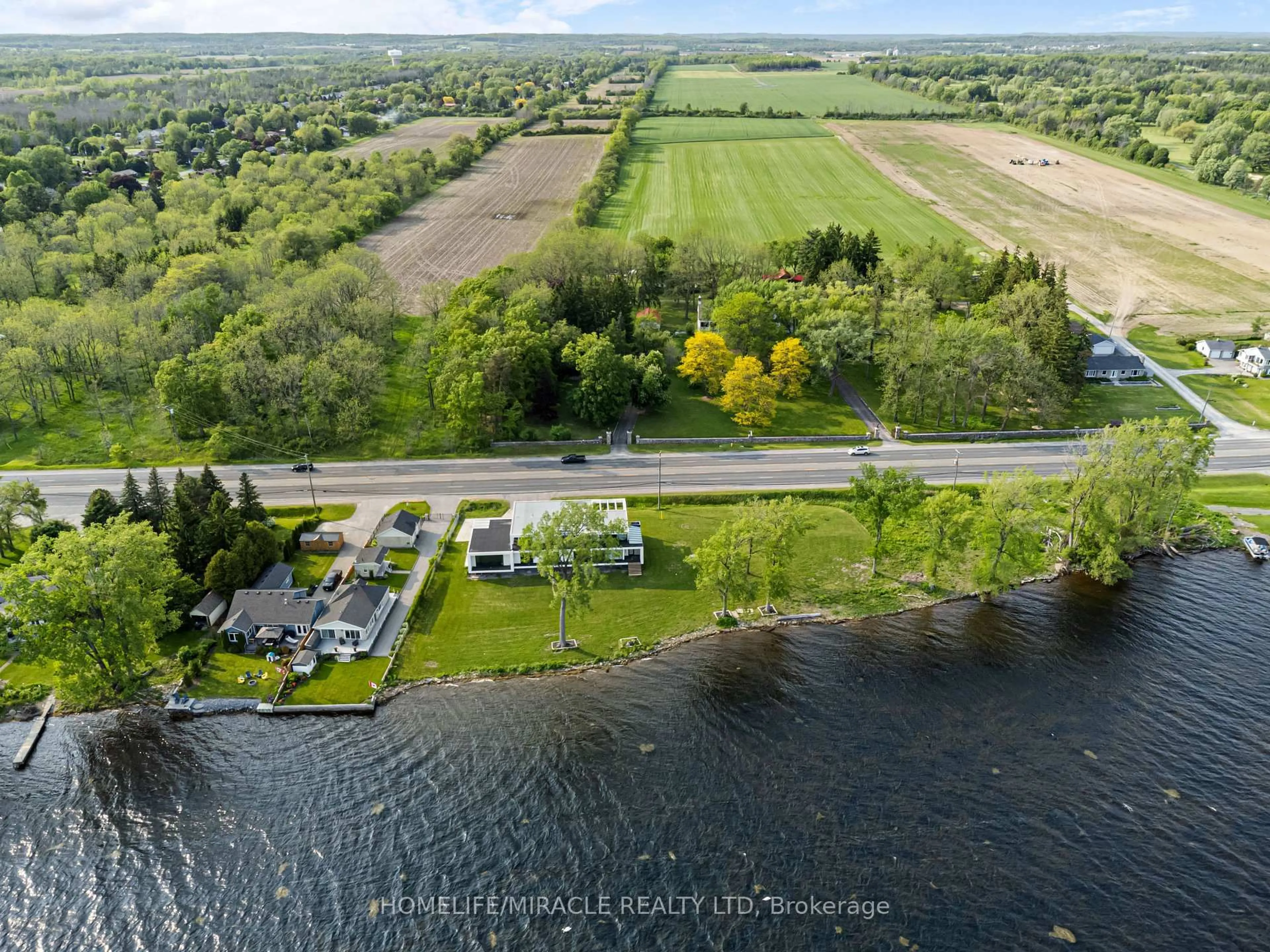 A pic from outside/outdoor area/front of a property/back of a property/a pic from drone, water/lake/river/ocean view for 1722 Old Highway 2, Belleville Ontario K8N 4Z2