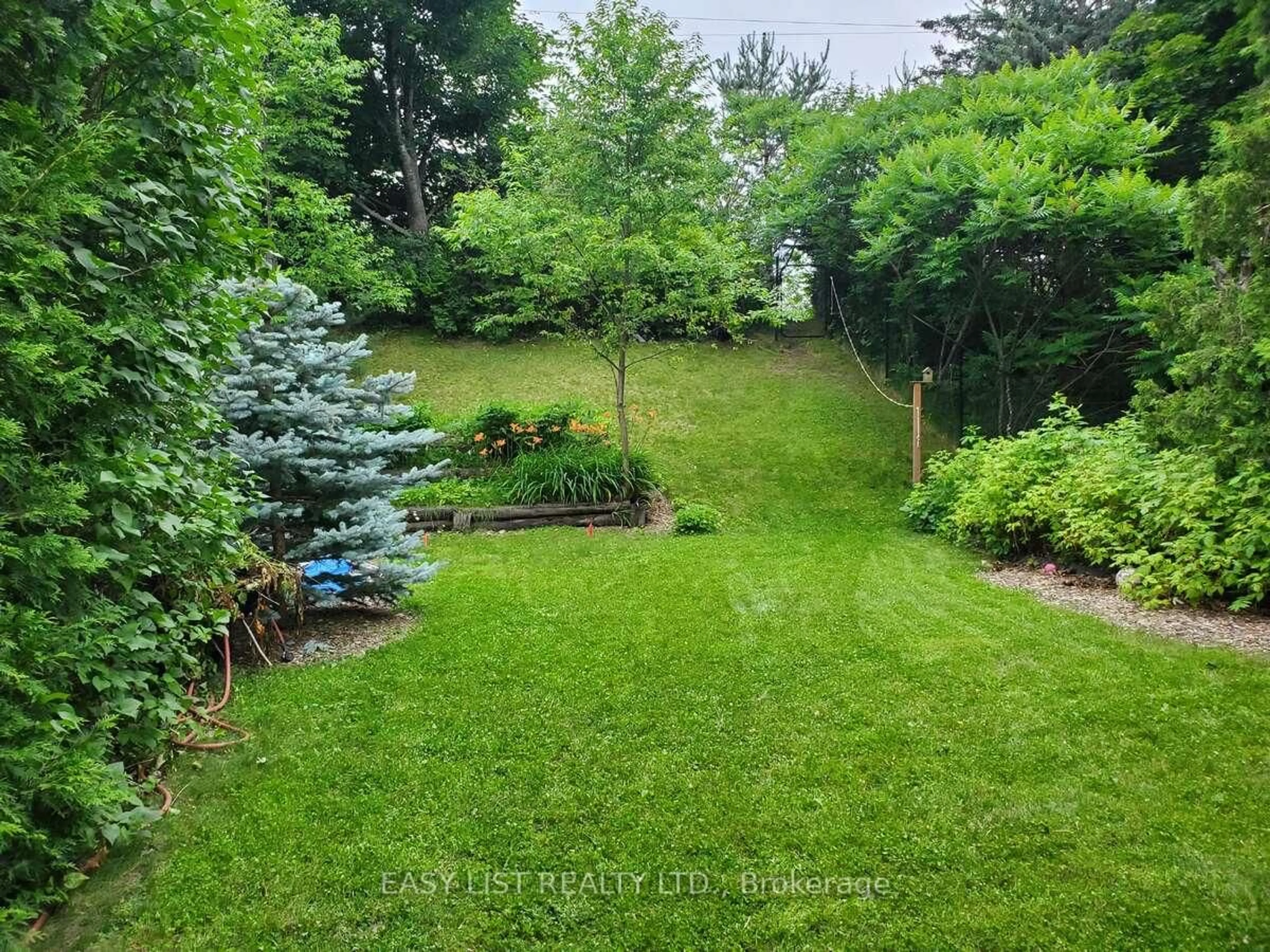 A pic from outside/outdoor area/front of a property/back of a property/a pic from drone, forest/trees view for 73 Hobart Cres, Ottawa Ontario K2H 5S3