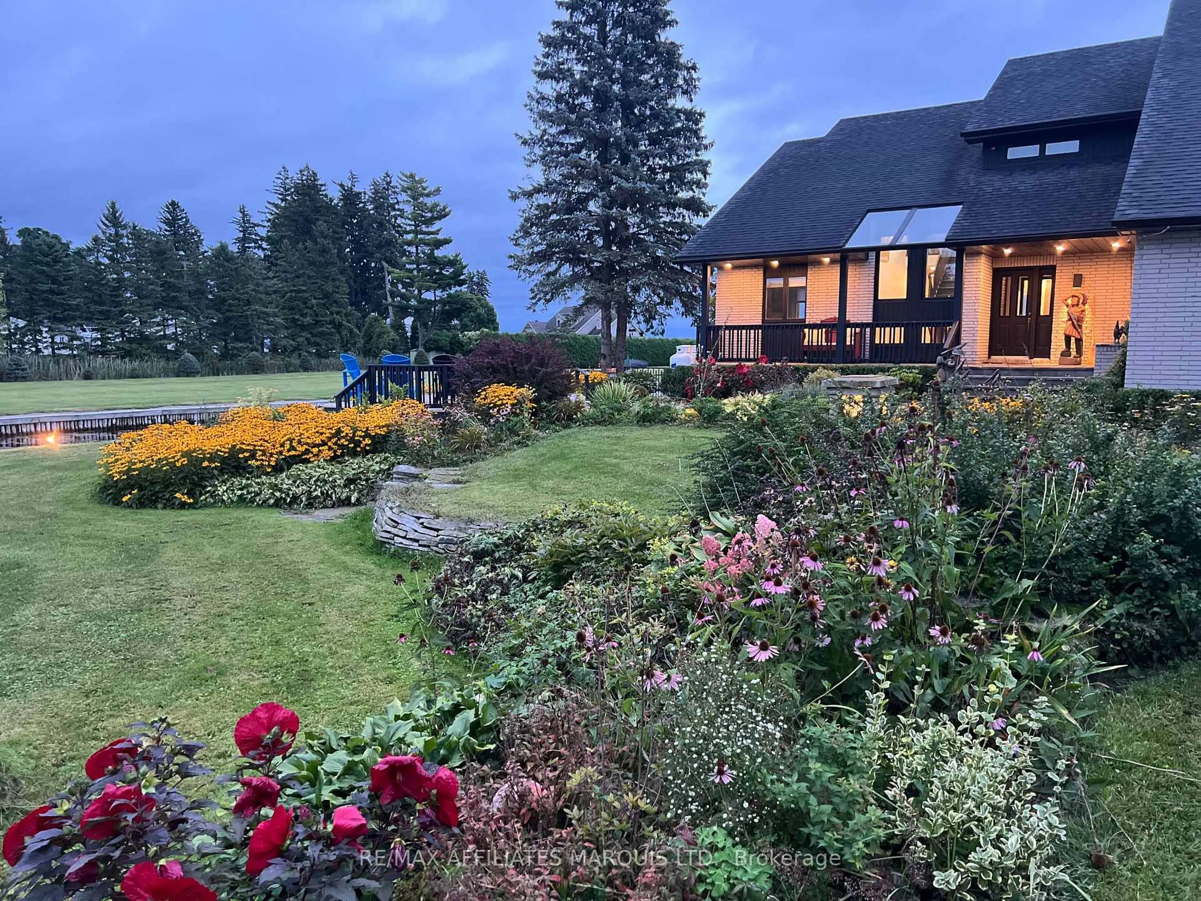 A pic from outside/outdoor area/front of a property/back of a property/a pic from drone, water/lake/river/ocean view for 20214 County Rd 2 Rd, South Glengarry Ontario K0C 2E0