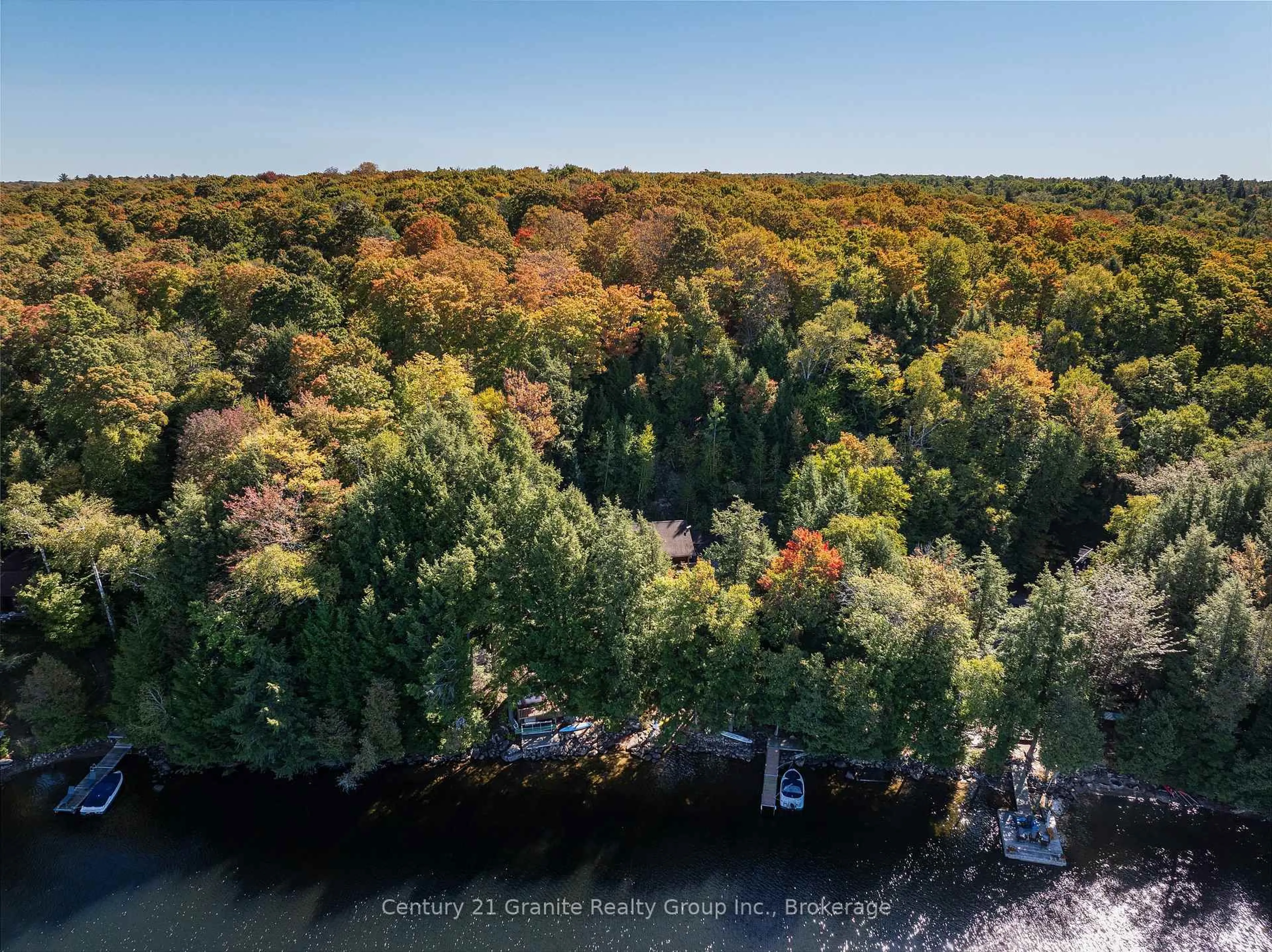 A pic from outside/outdoor area/front of a property/back of a property/a pic from drone, water/lake/river/ocean view for 1219 Marathon Dr, Minden Hills Ontario K0M 2K0
