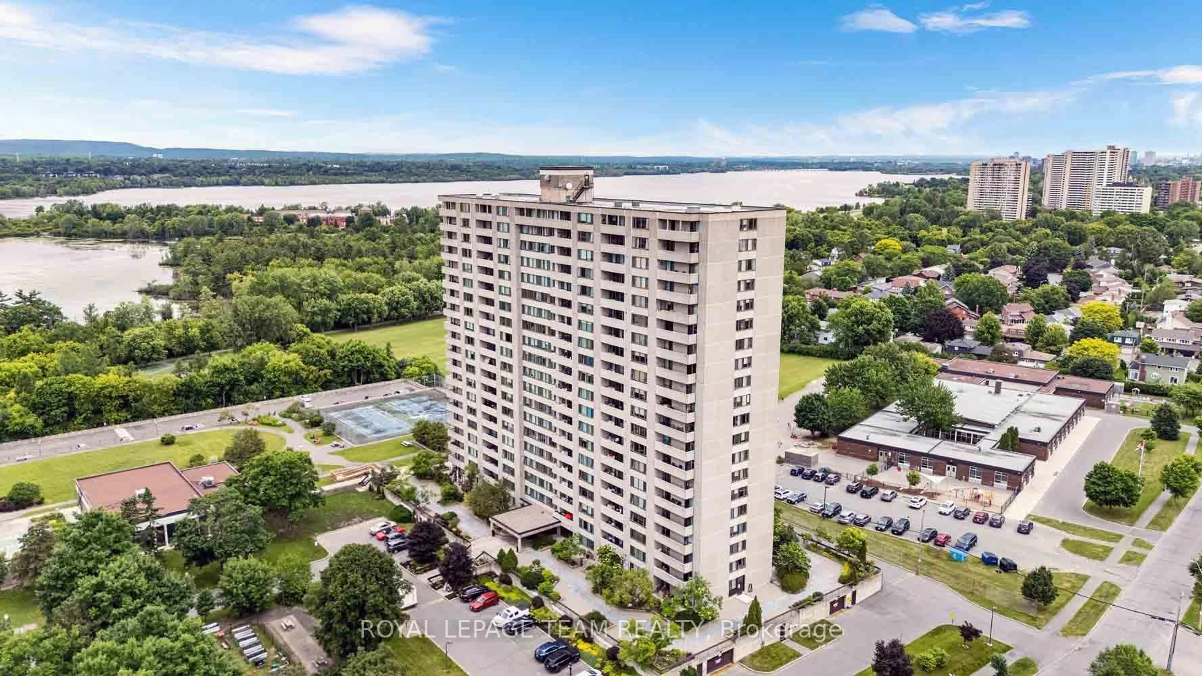 A pic from outside/outdoor area/front of a property/back of a property/a pic from drone, water/lake/river/ocean view for 2625 Regina St #507, Ottawa Ontario K2B 5W8