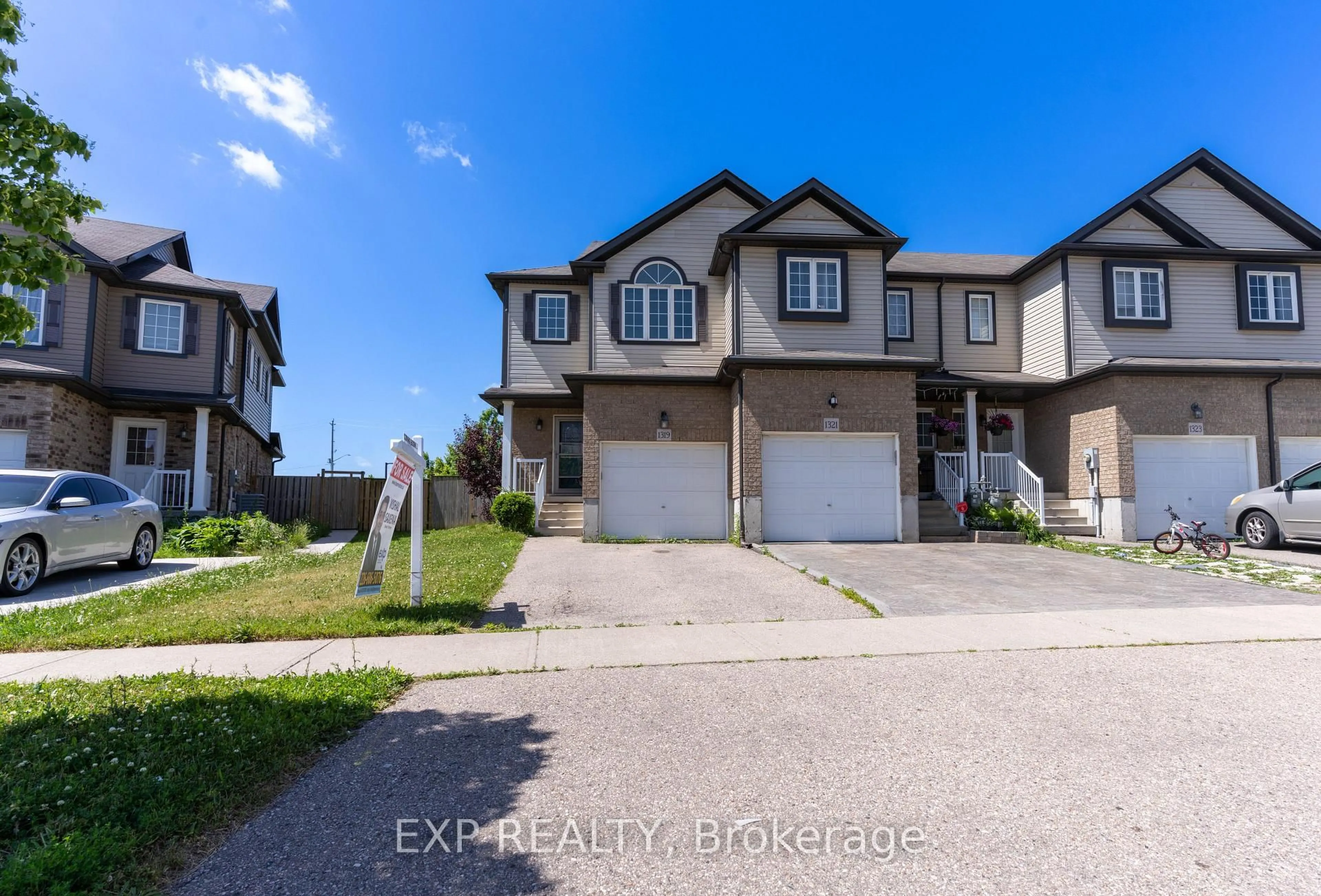 A pic from outside/outdoor area/front of a property/back of a property/a pic from drone, street for 1319 COUNTRYSTONE Dr, Kitchener Ontario N2N 3R9