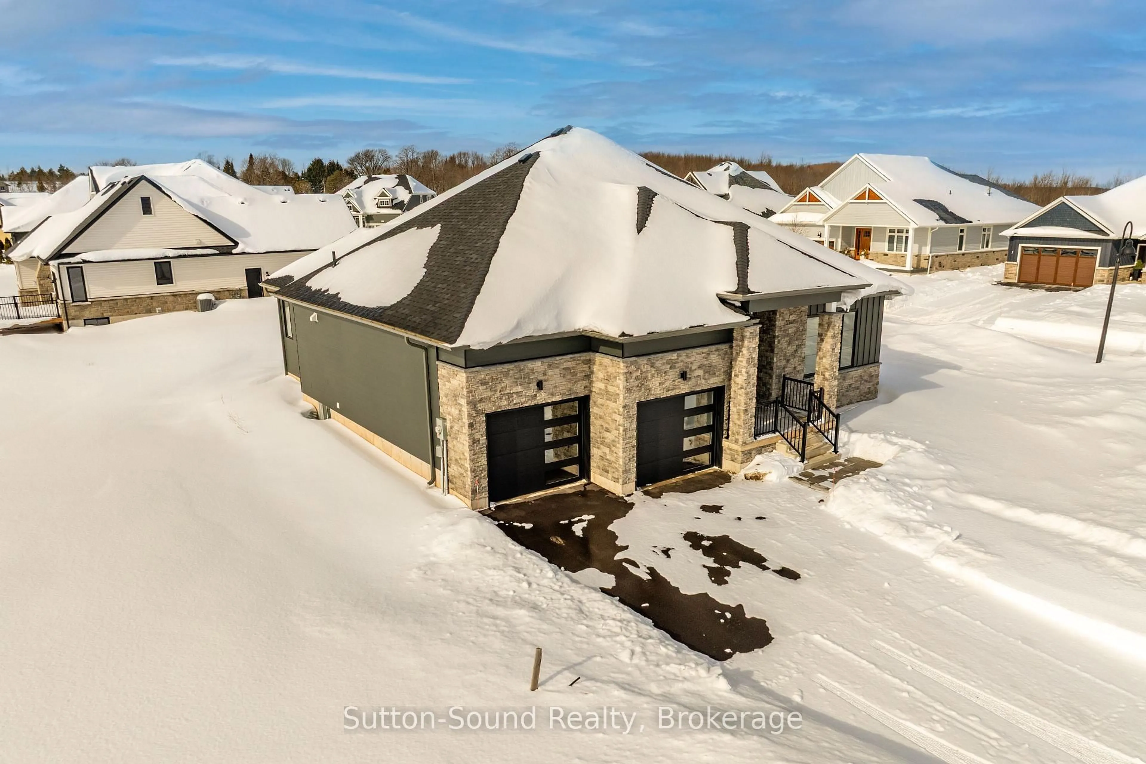 A pic from outside/outdoor area/front of a property/back of a property/a pic from drone, street for 116 Laurens Lane, Georgian Bluffs Ontario N0H 1S0
