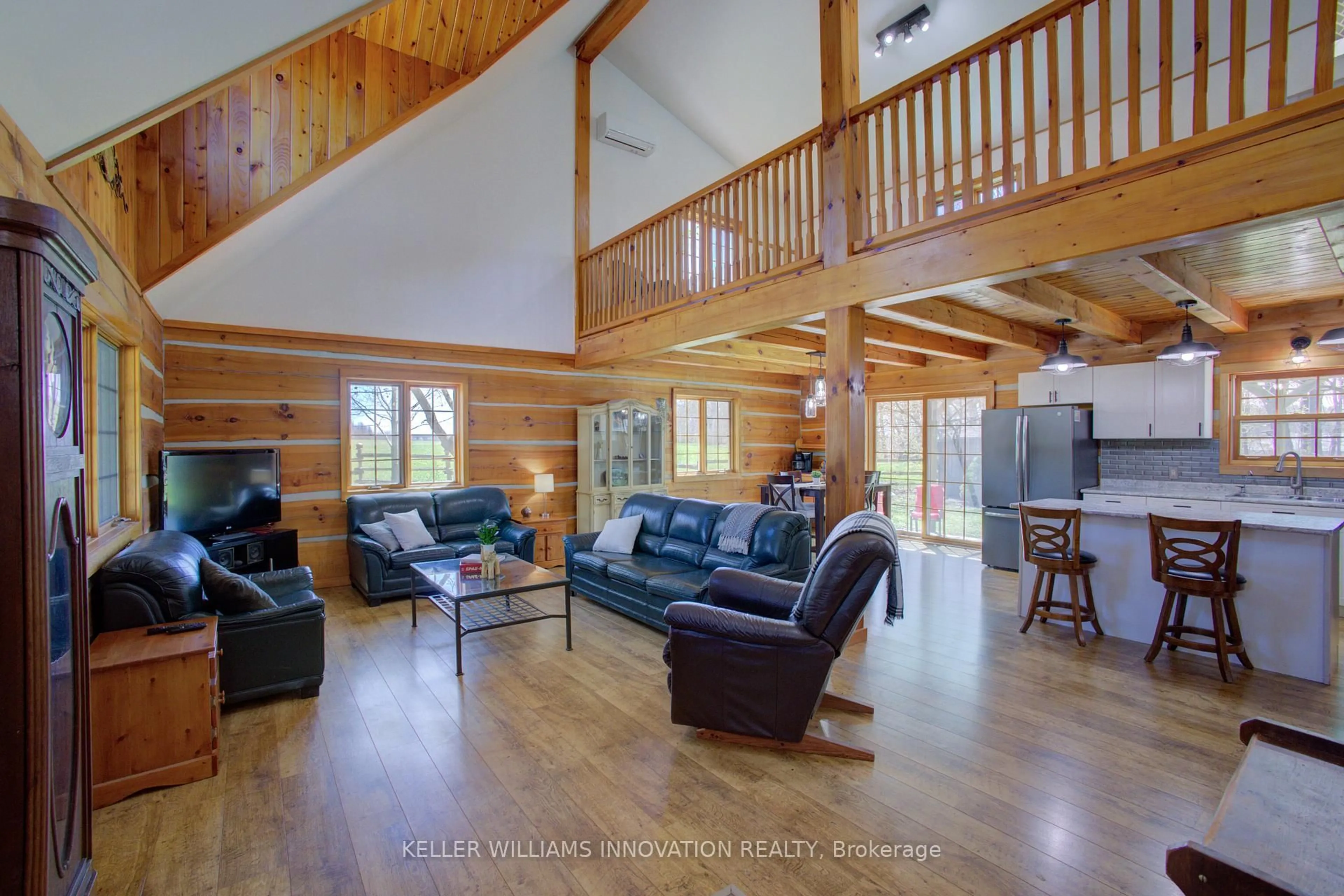 Living room with furniture, wood/laminate floor for 802080 Grey Road 40, Chatsworth Ontario N0H 1G0