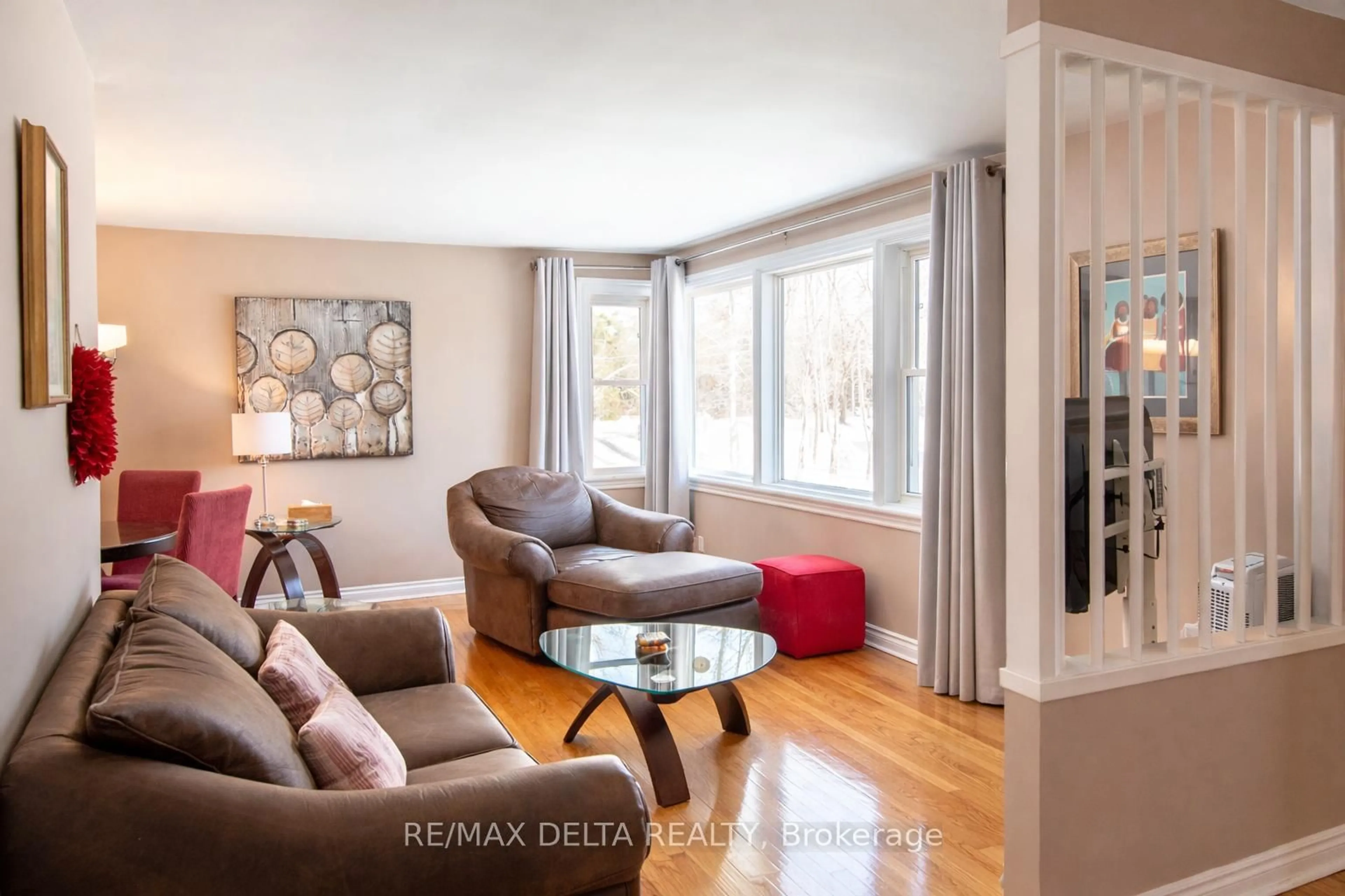 Living room with furniture, wood/laminate floor for 289 County Rd. 19 Rd, Alfred and Plantagenet Ontario K0A 3K0