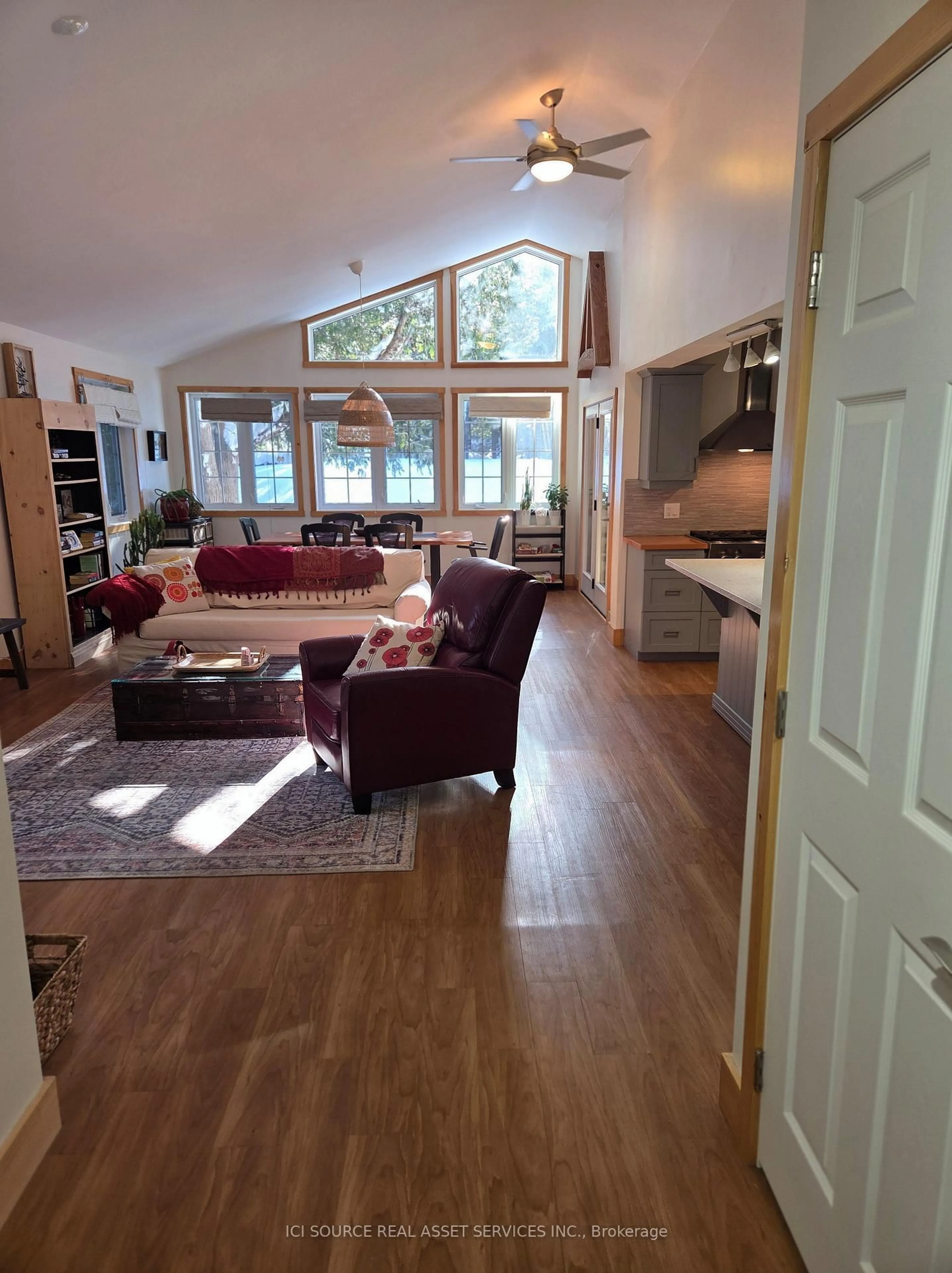 Living room with furniture, wood/laminate floor for 48 Head St, Northern Bruce Peninsula Ontario N0H 2R0