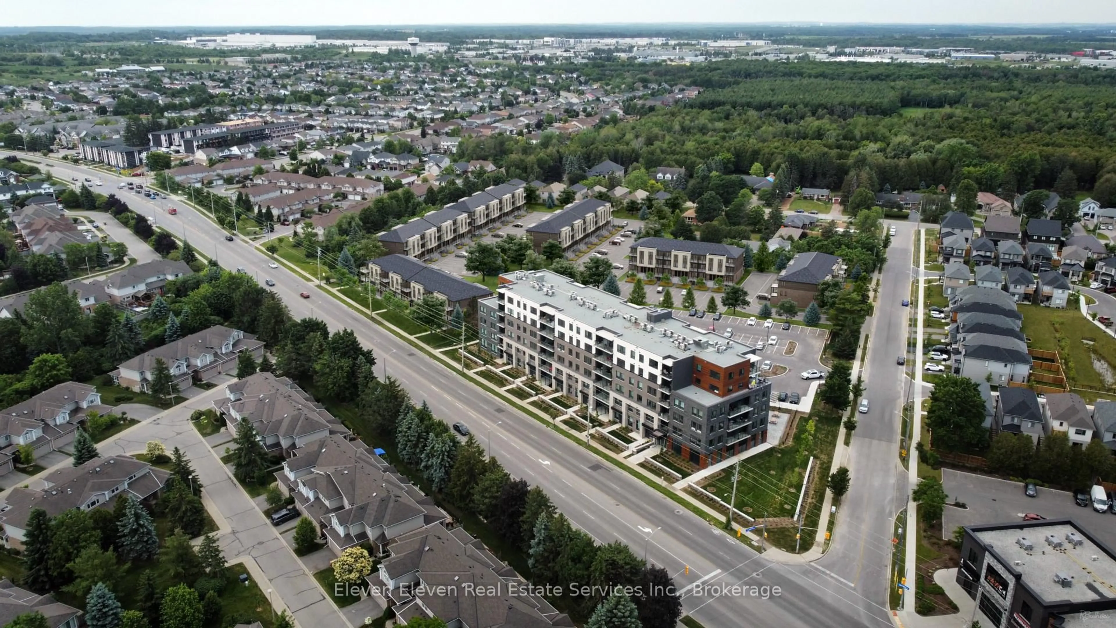 A pic from outside/outdoor area/front of a property/back of a property/a pic from drone, street for 42 Lowes Rd #18, Guelph Ontario N1G 0H2