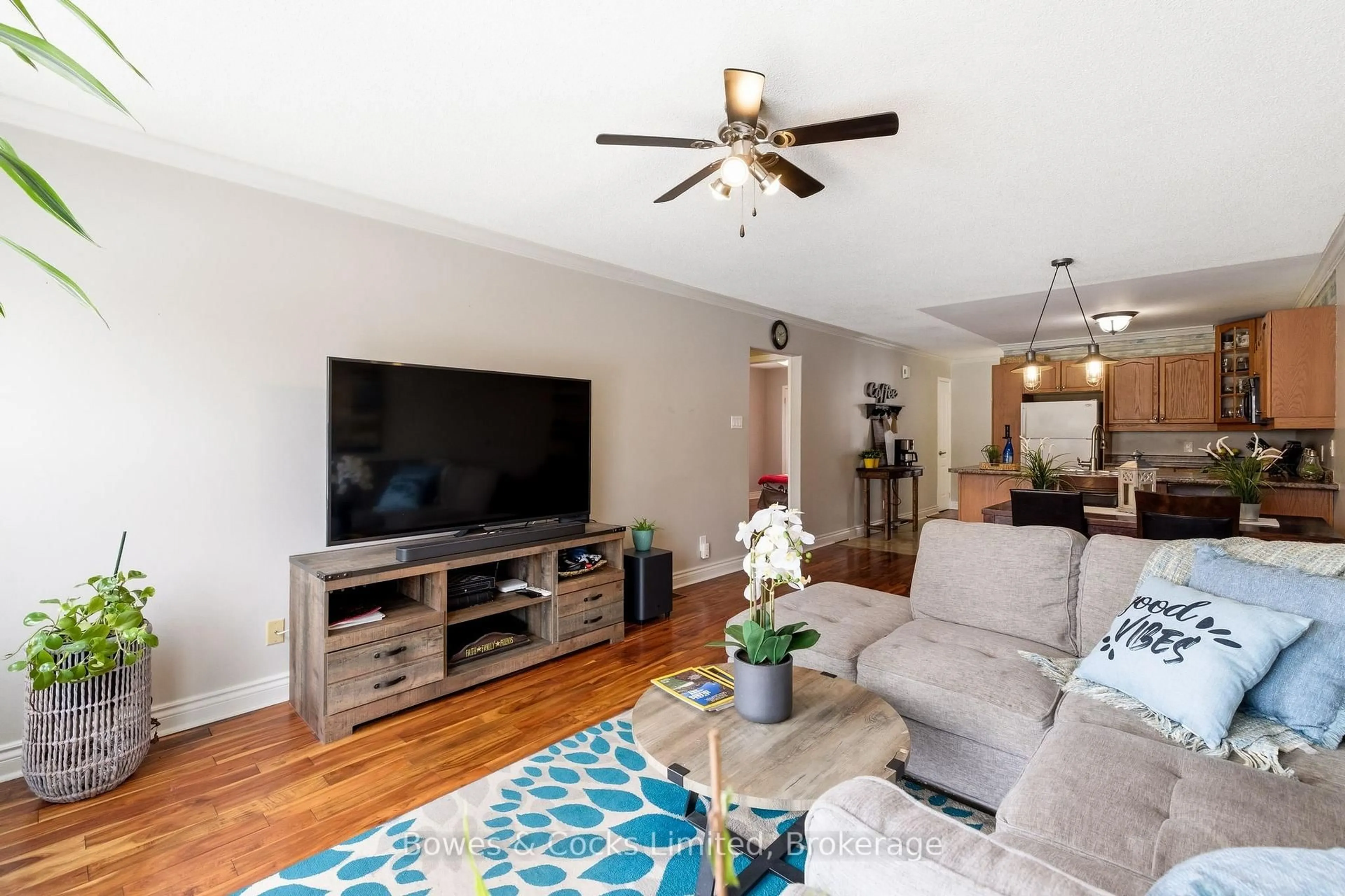 Living room with furniture, wood/laminate floor for 347 Middlefield Rd, Peterborough Ontario K9J 8S4
