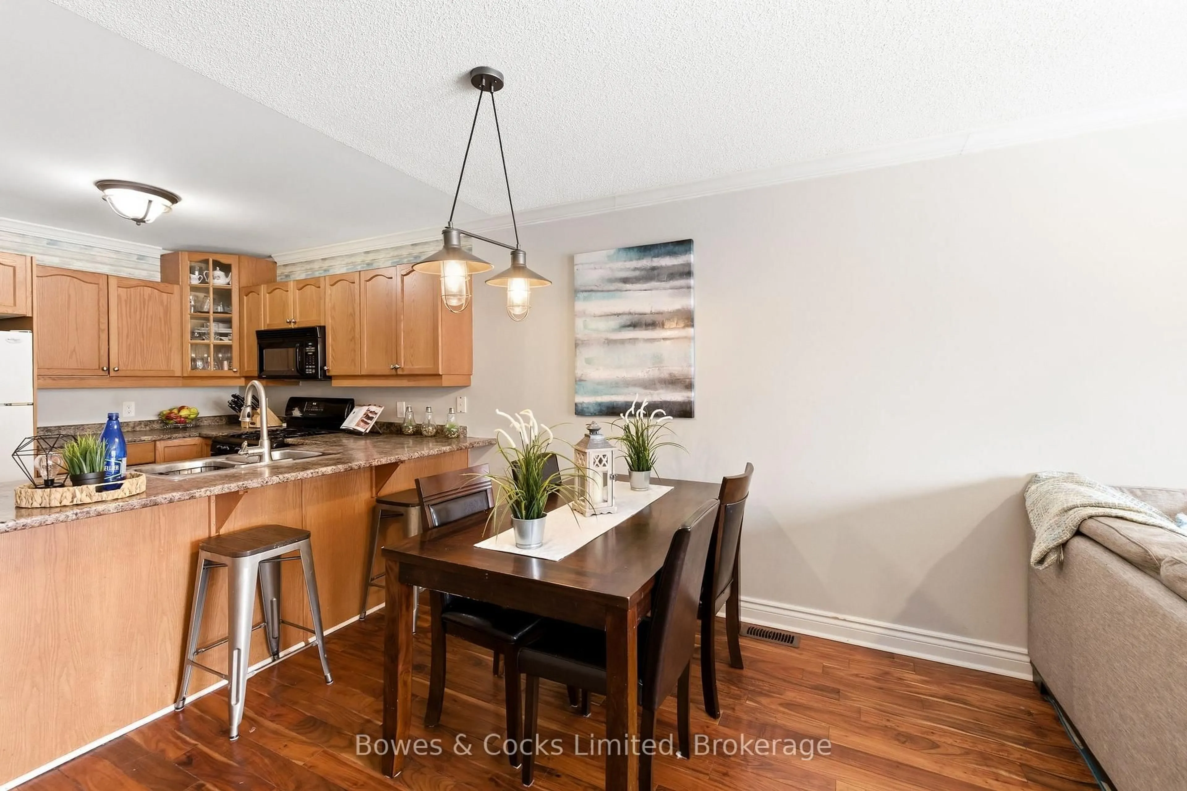 Open concept kitchen, wood/laminate floor for 347 Middlefield Rd, Peterborough Ontario K9J 8S4