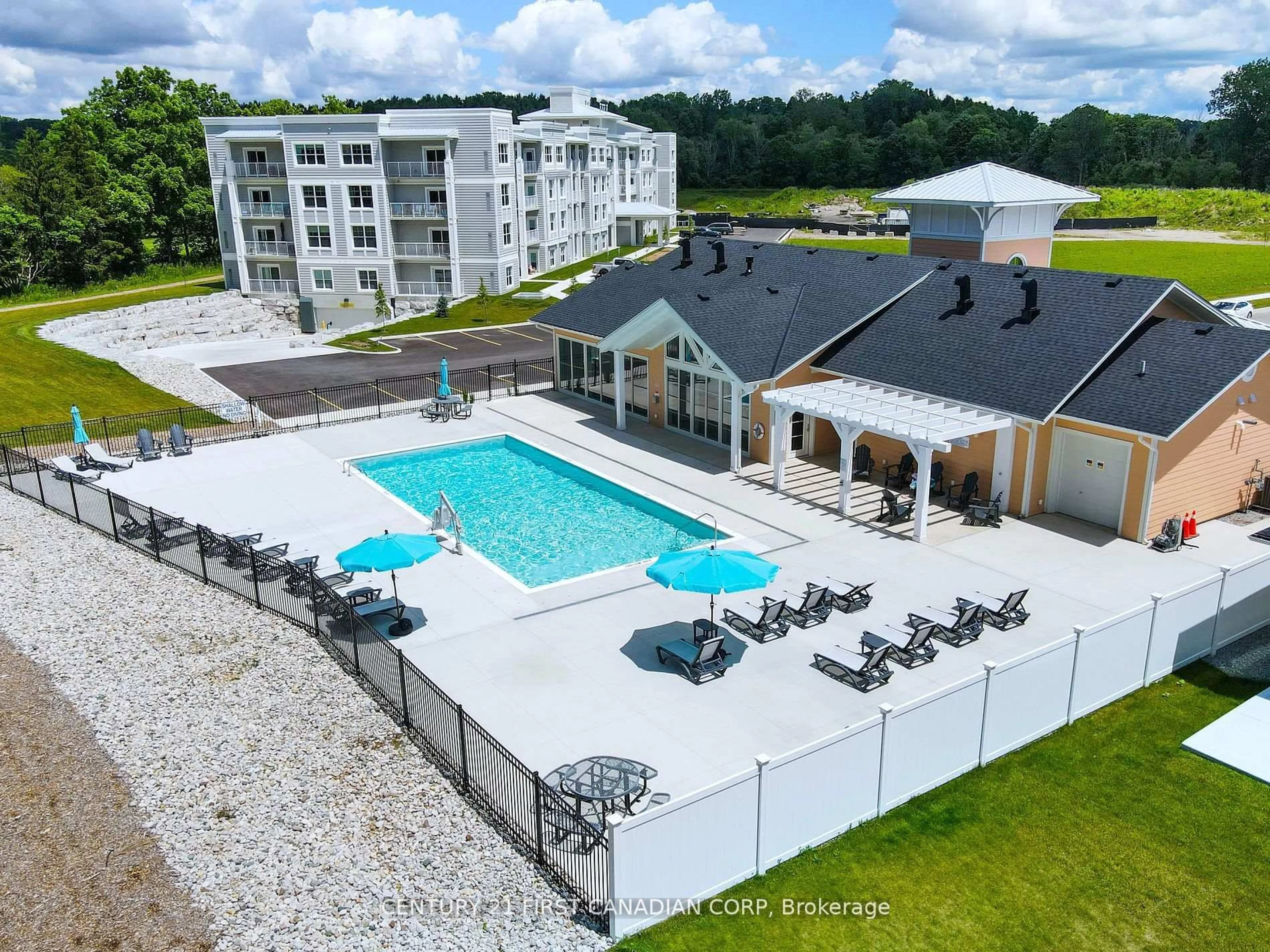 A pic from outside/outdoor area/front of a property/back of a property/a pic from drone, water/lake/river/ocean view for 100 The Promenade #403, Central Elgin Ontario N5L 0B7