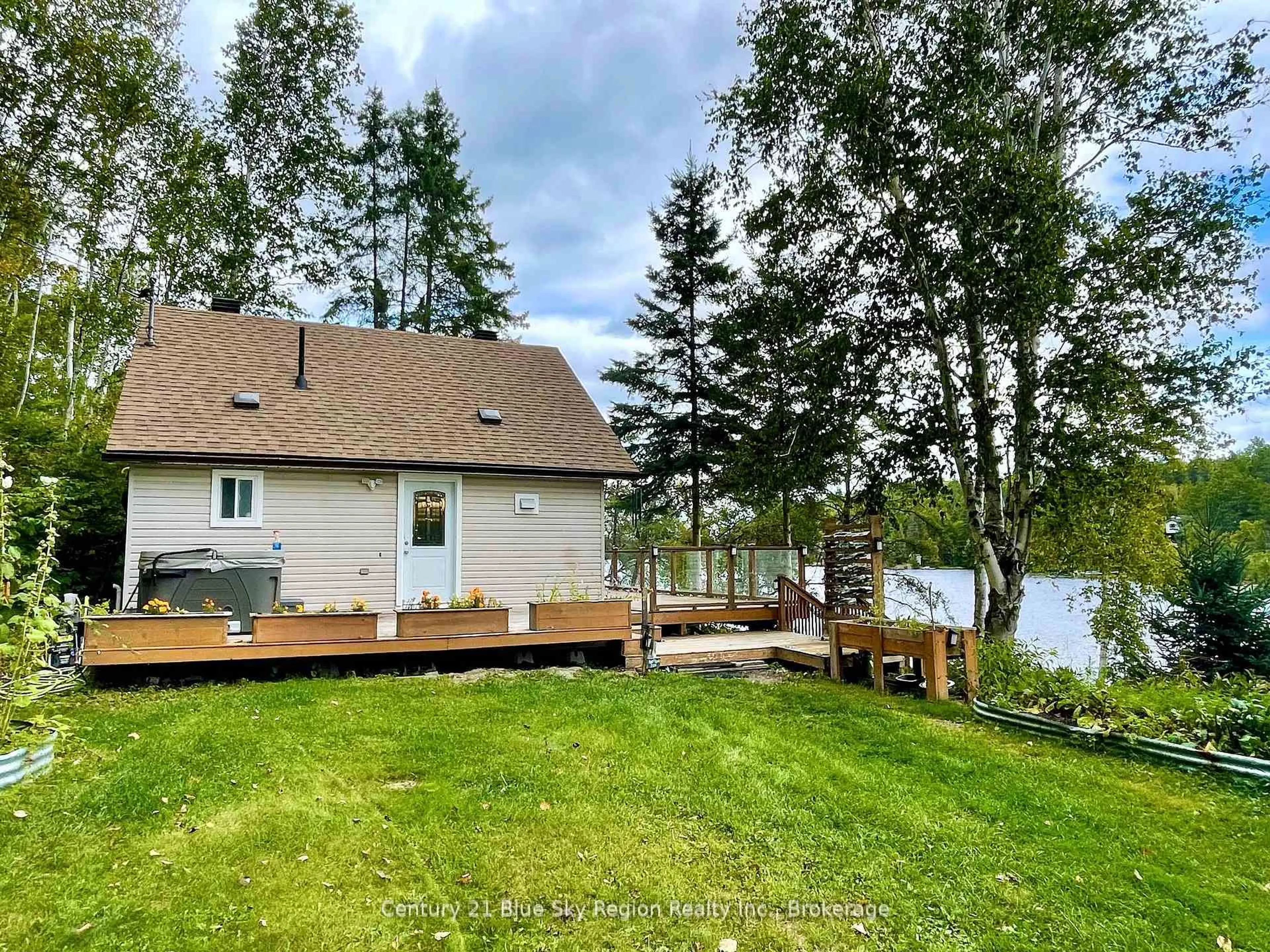 A pic from outside/outdoor area/front of a property/back of a property/a pic from drone, water/lake/river/ocean view for 93 A Hood Ave, Markstay-Warren Ontario P0M 1C0