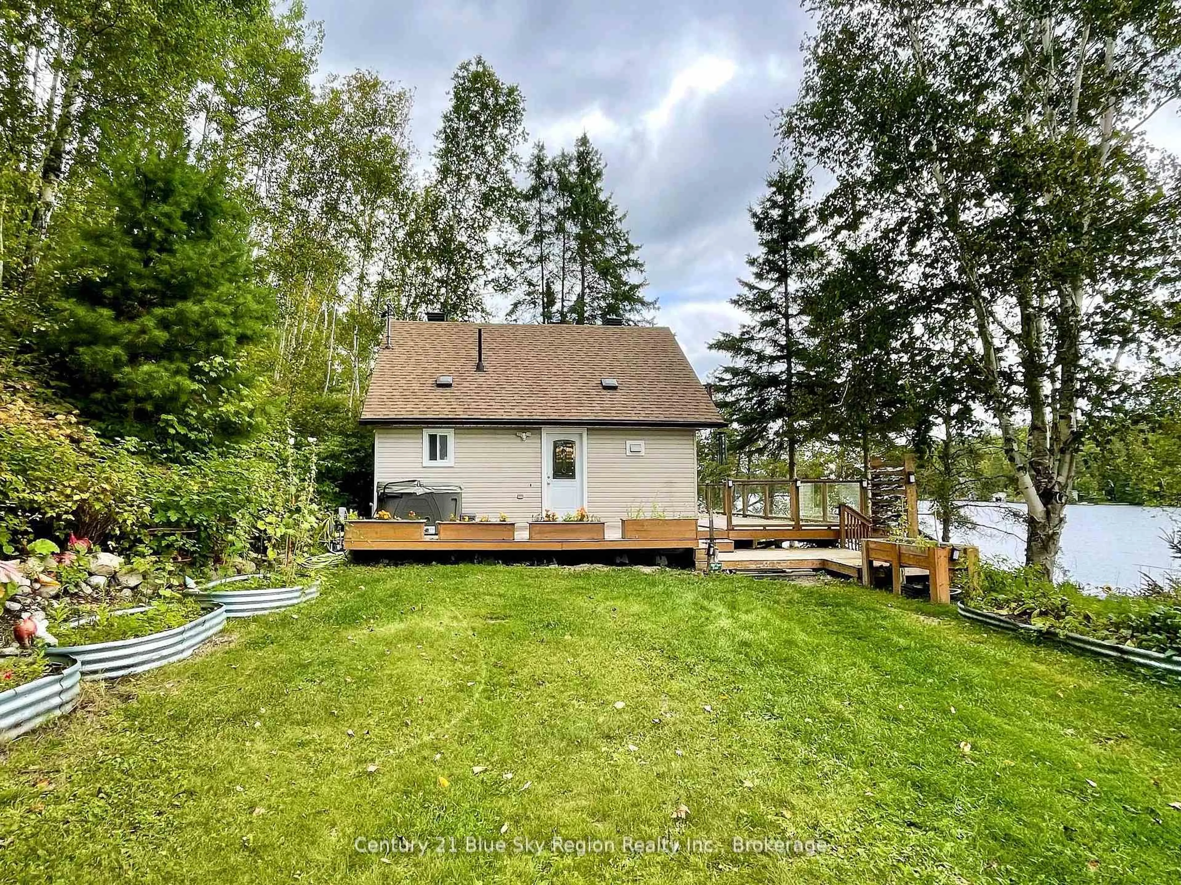 A pic from outside/outdoor area/front of a property/back of a property/a pic from drone, water/lake/river/ocean view for 93 A Hood Ave, Markstay-Warren Ontario P0M 1C0