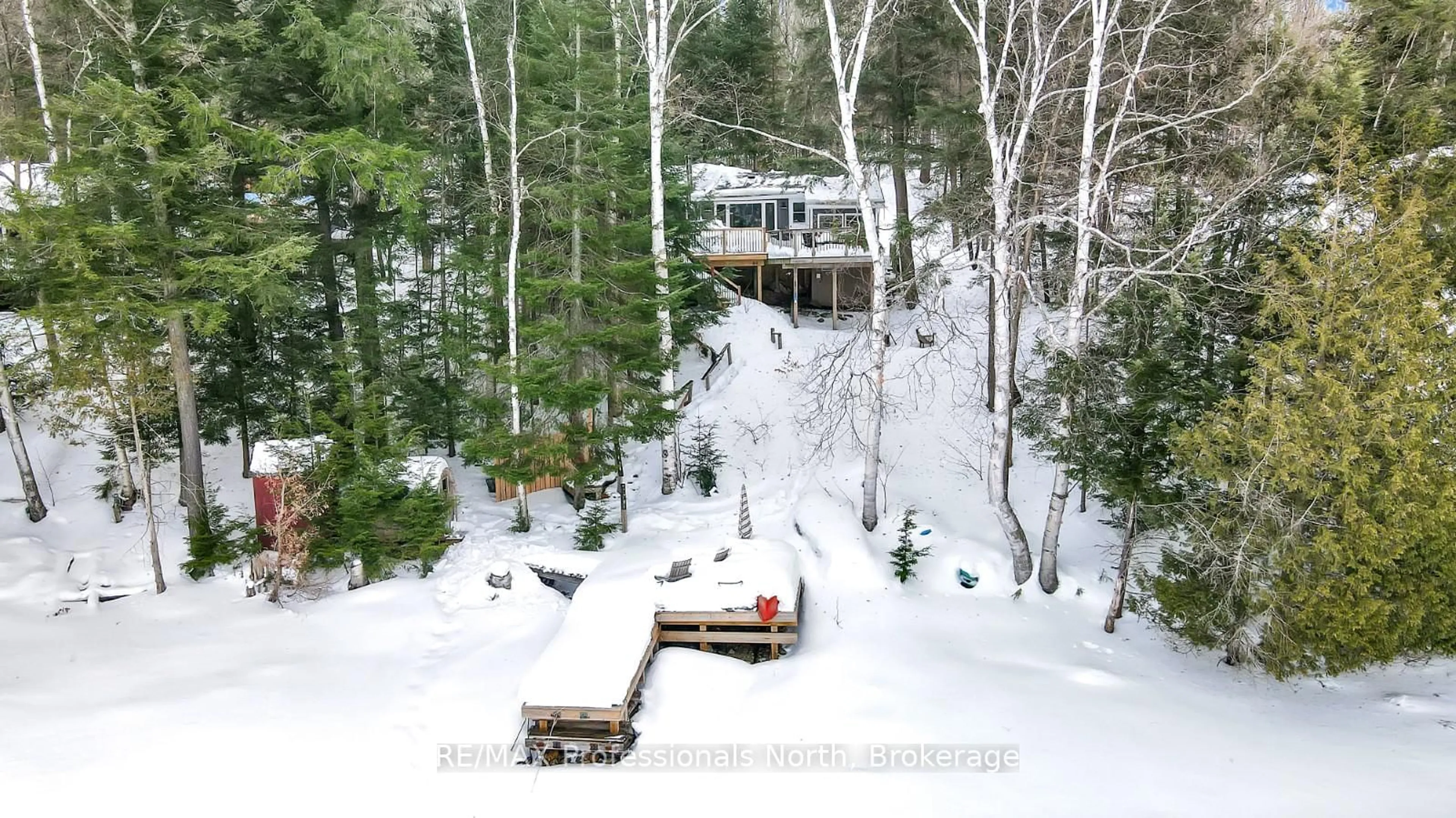 A pic from outside/outdoor area/front of a property/back of a property/a pic from drone, forest/trees view for 1016 Linsmore Lane, Dysart et al Ontario K0M 1S0