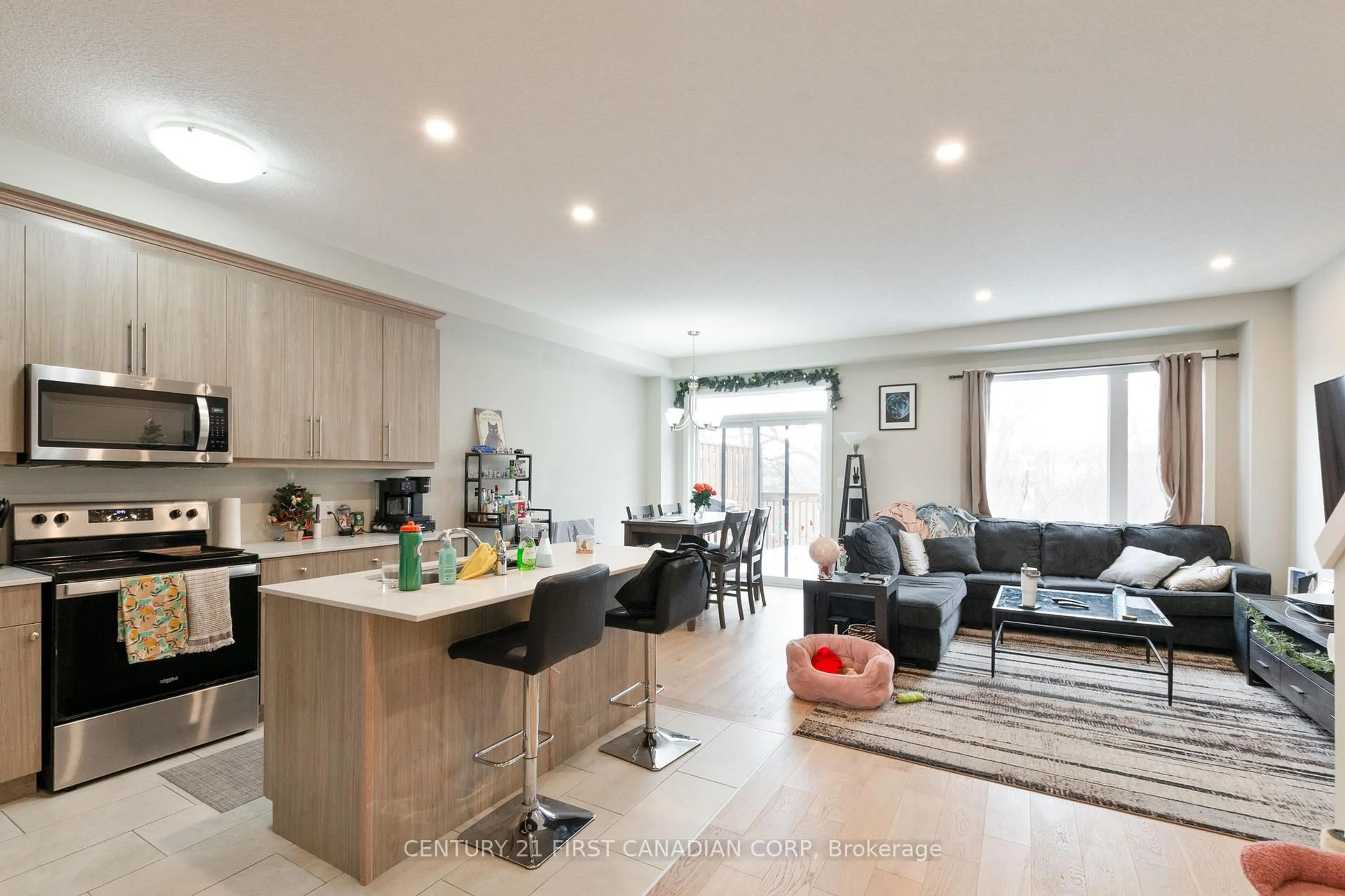 Open concept kitchen, wood/laminate floor for 177 Edgevalley Rd #66, London East Ontario N5V 0C5