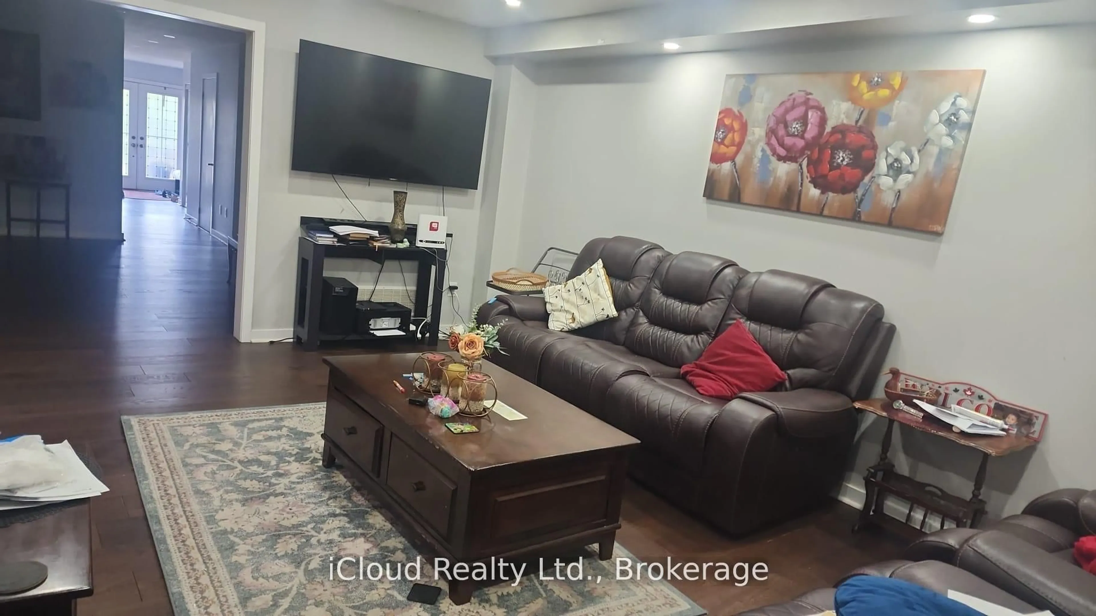 Living room with furniture, wood/laminate floor for 88 West Glen Ave, Hamilton Ontario L8J 0H8