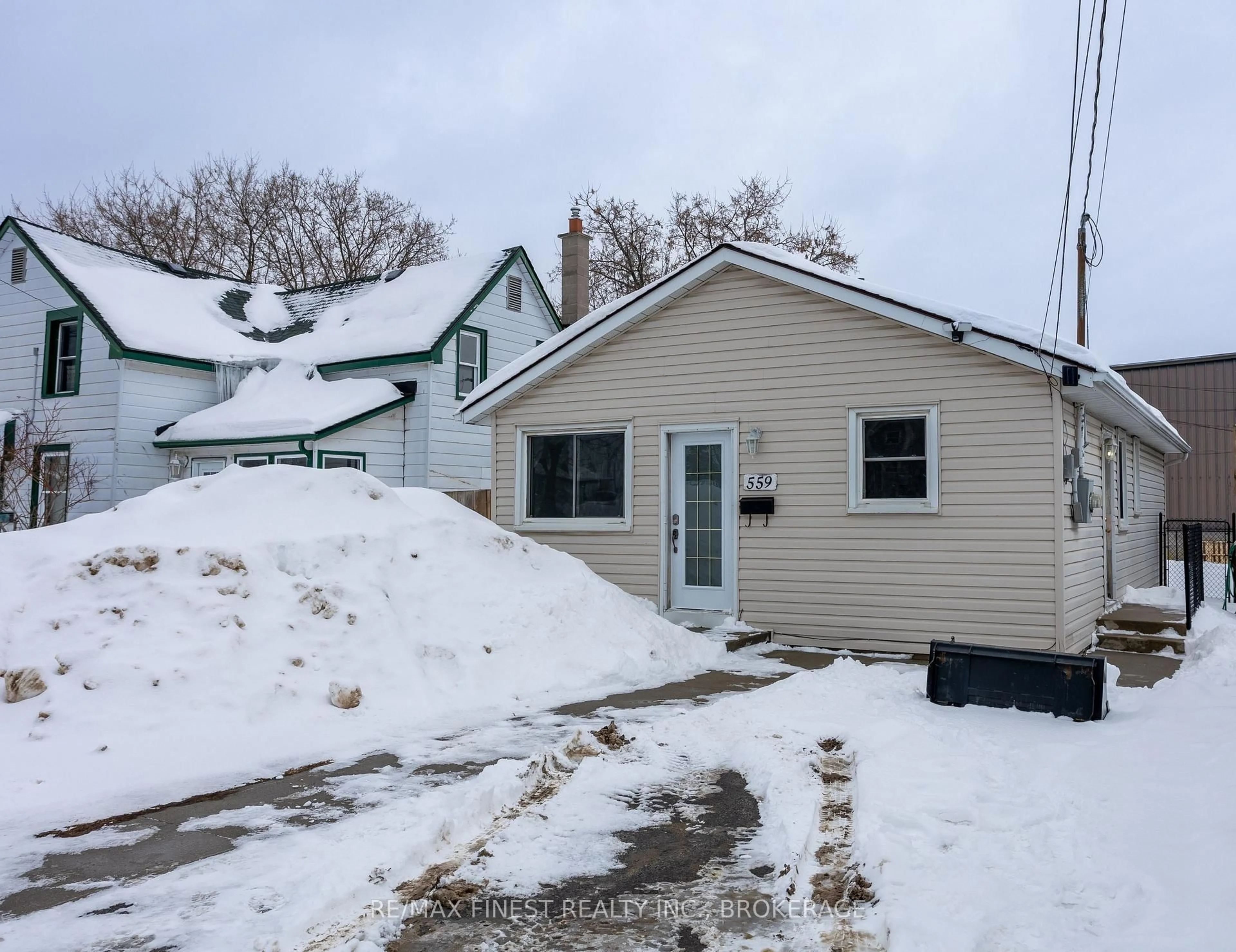 A pic from outside/outdoor area/front of a property/back of a property/a pic from drone, street for 559 MacDonnell St, Kingston Ontario K7K 4W9