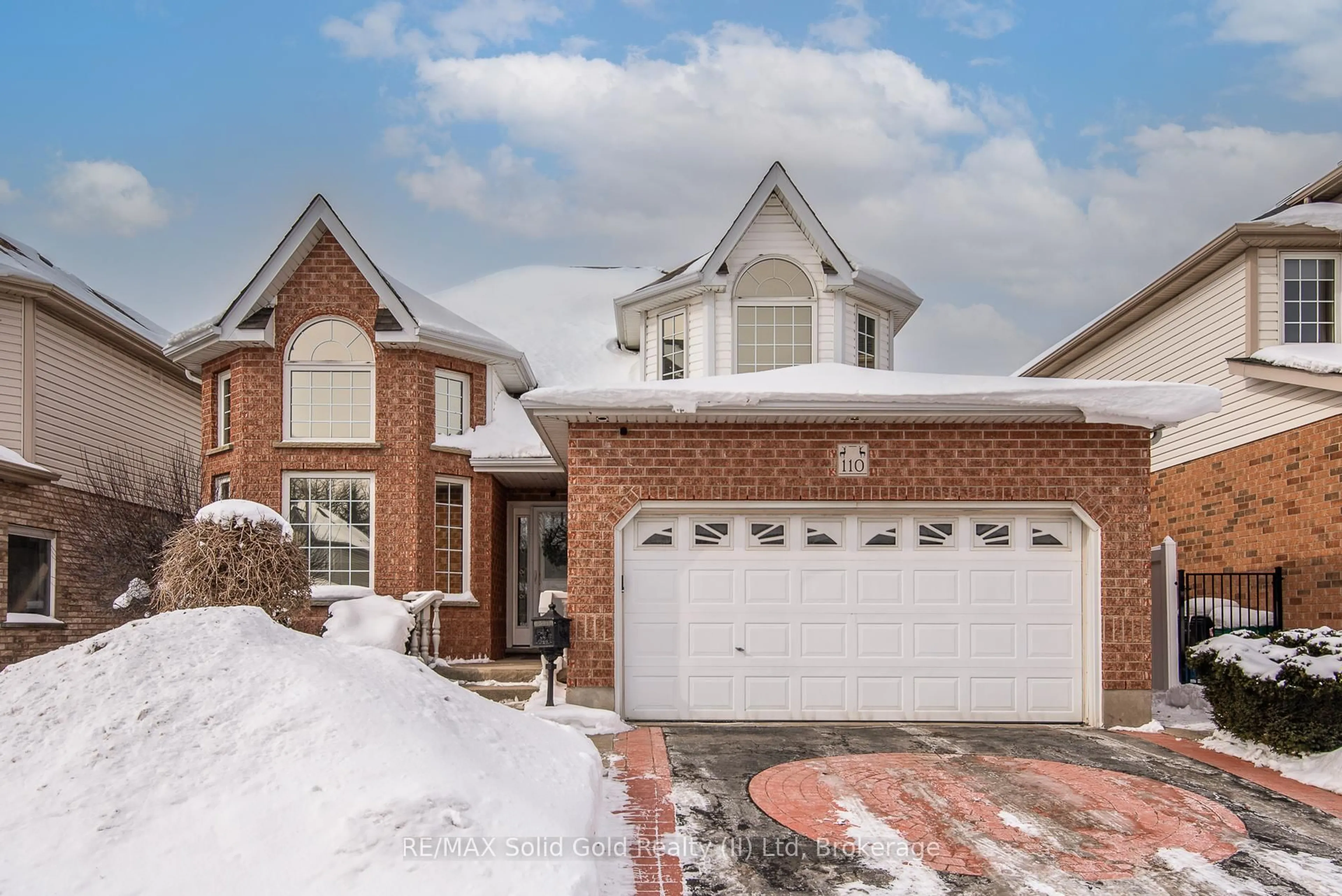 Home with brick exterior material, street for 110 Deer Ridge Dr, Kitchener Ontario N2P 2K9