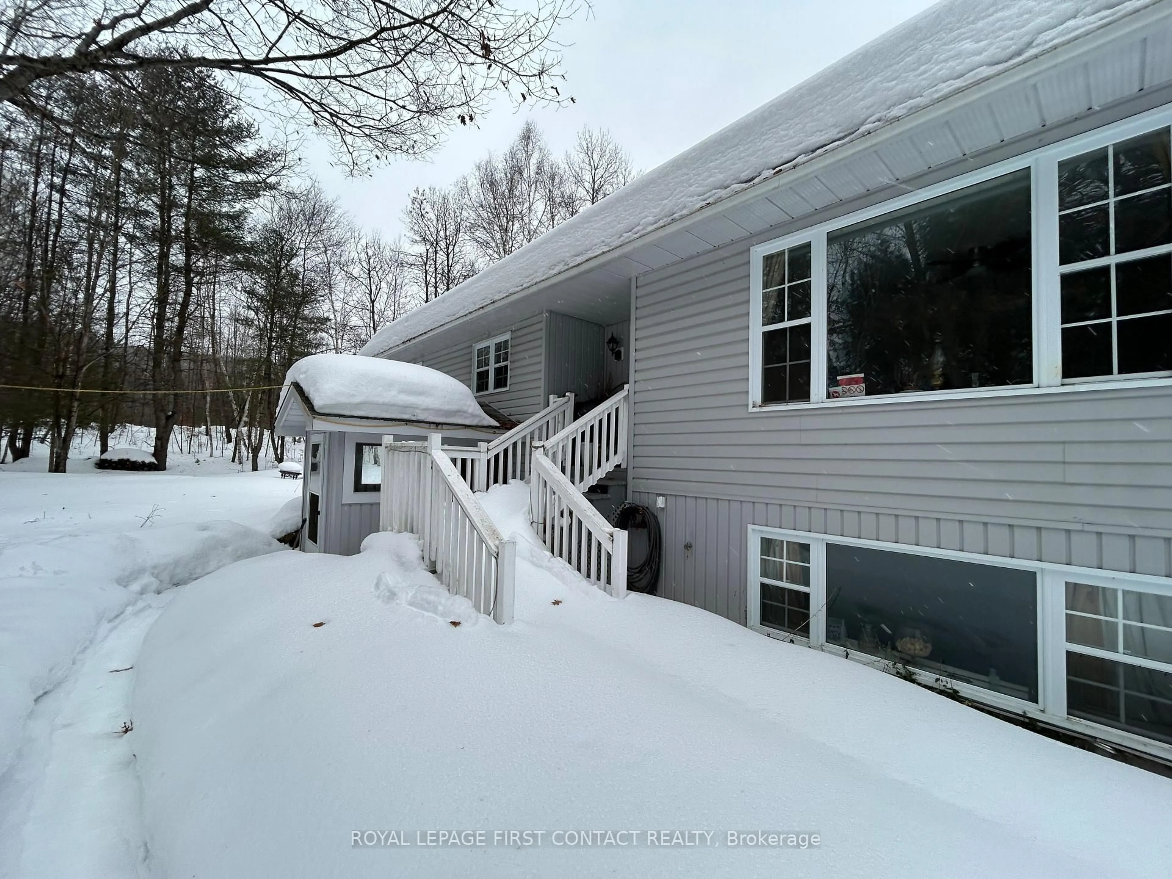 A pic from outside/outdoor area/front of a property/back of a property/a pic from drone, unknown for 1041 Welch Rd, Minden Hills Ontario K0M 2K0