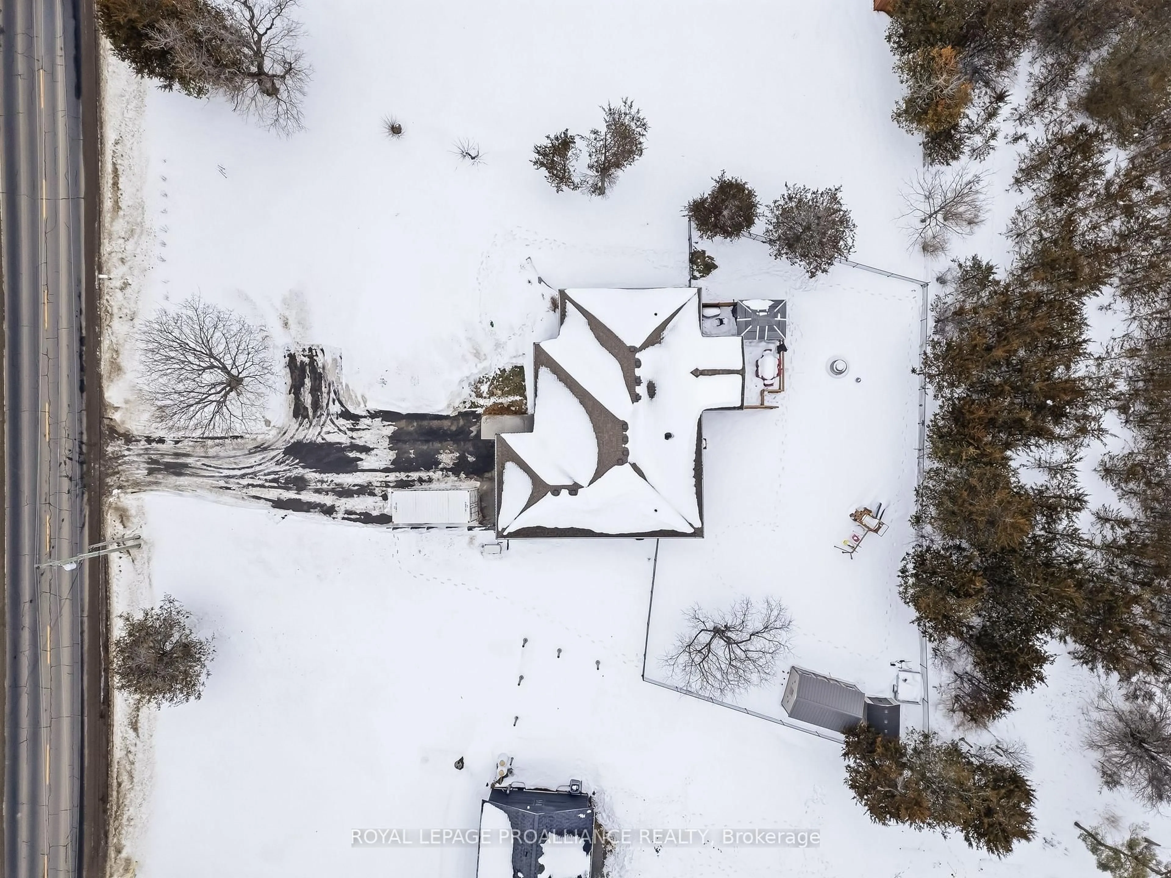 A pic from outside/outdoor area/front of a property/back of a property/a pic from drone, street for 3741 County Road 3, Prince Edward County Ontario K0K 1L0