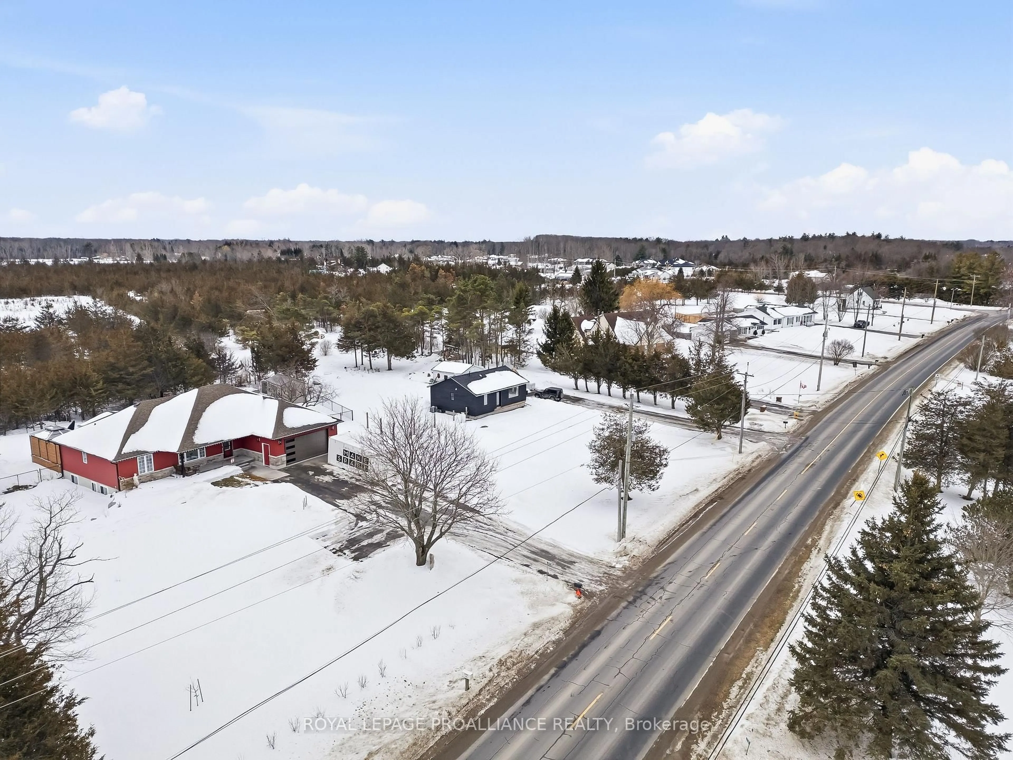A pic from outside/outdoor area/front of a property/back of a property/a pic from drone, street for 3741 County Road 3, Prince Edward County Ontario K0K 1L0