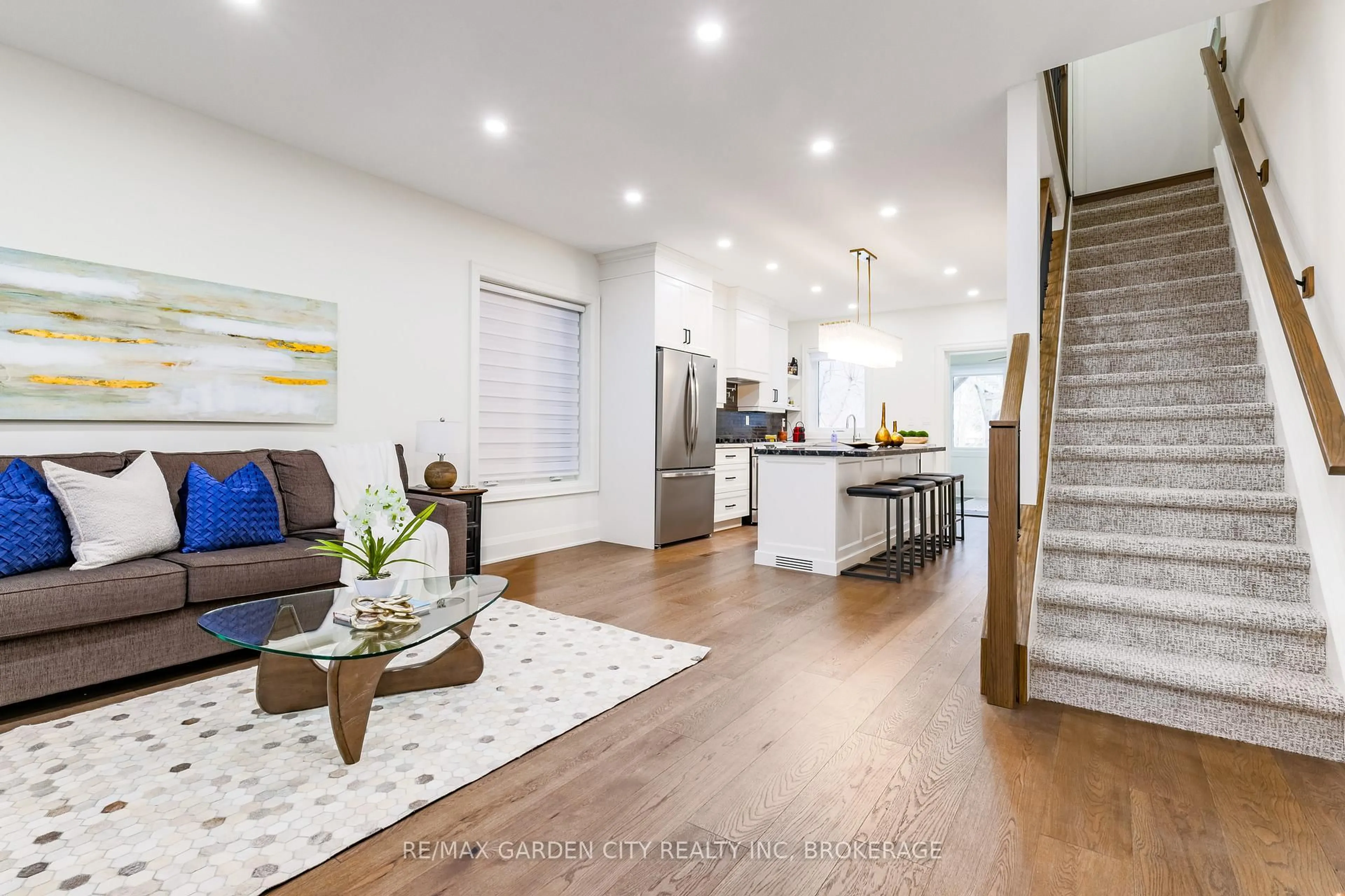 Open concept kitchen, wood/laminate floor for 254 St Clair Blvd, Hamilton Ontario L8M 2P2