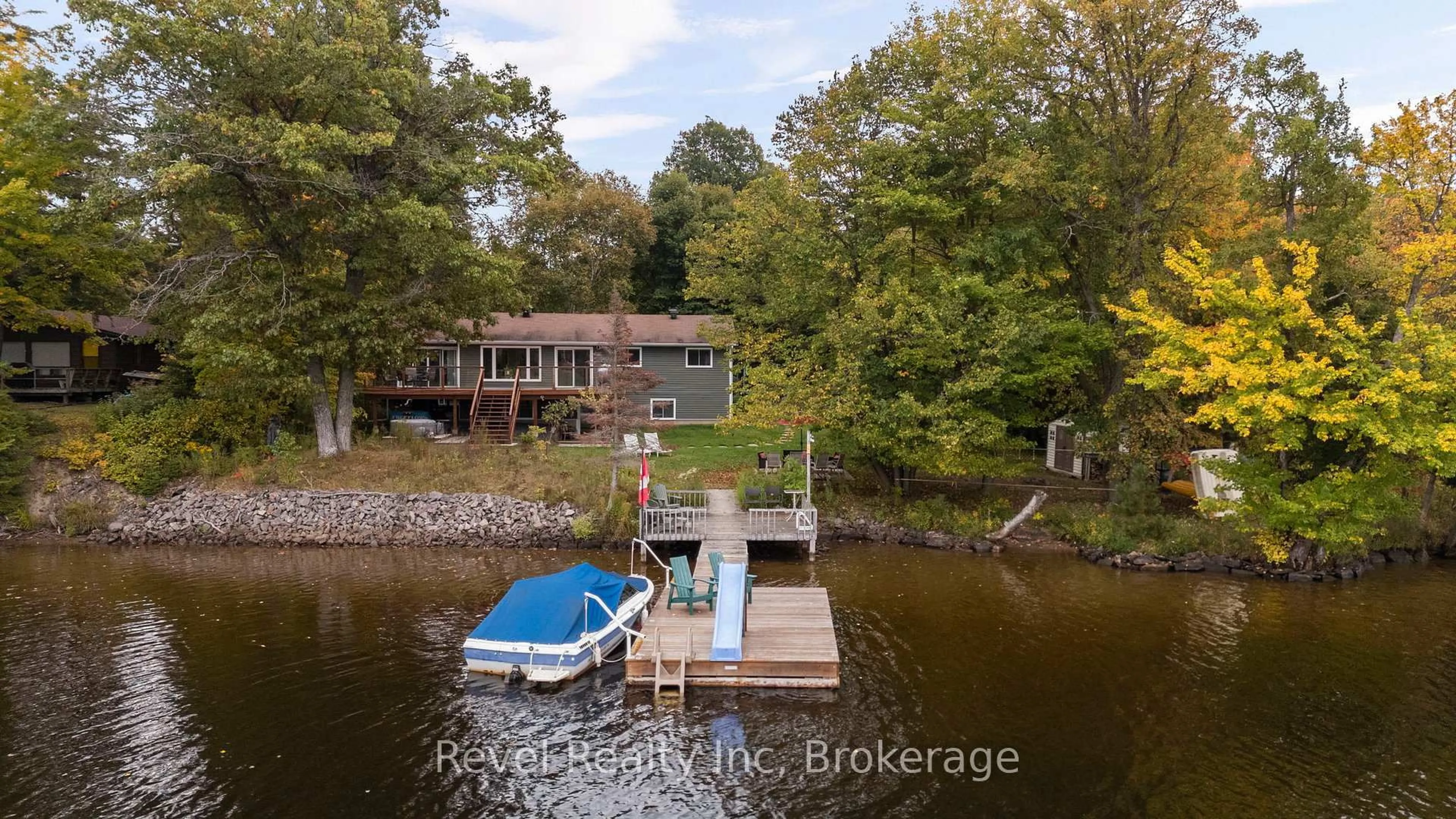 A pic from outside/outdoor area/front of a property/back of a property/a pic from drone, water/lake/river/ocean view for 210 Burnett's Rd, McKellar Ontario P2A 0B5