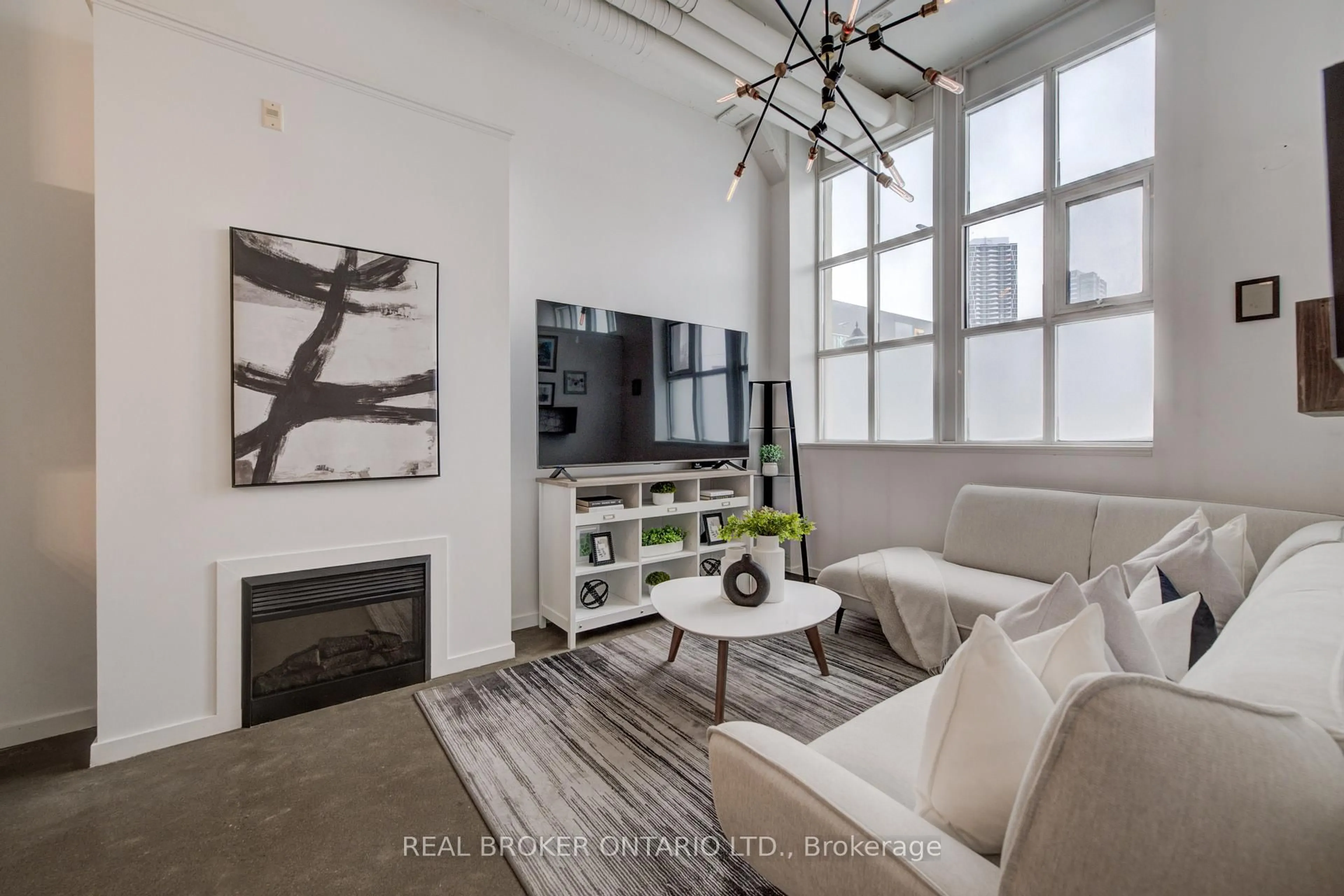 Living room with furniture, cement floor for 410 King St #126, Kitchener Ontario N2G 1C3