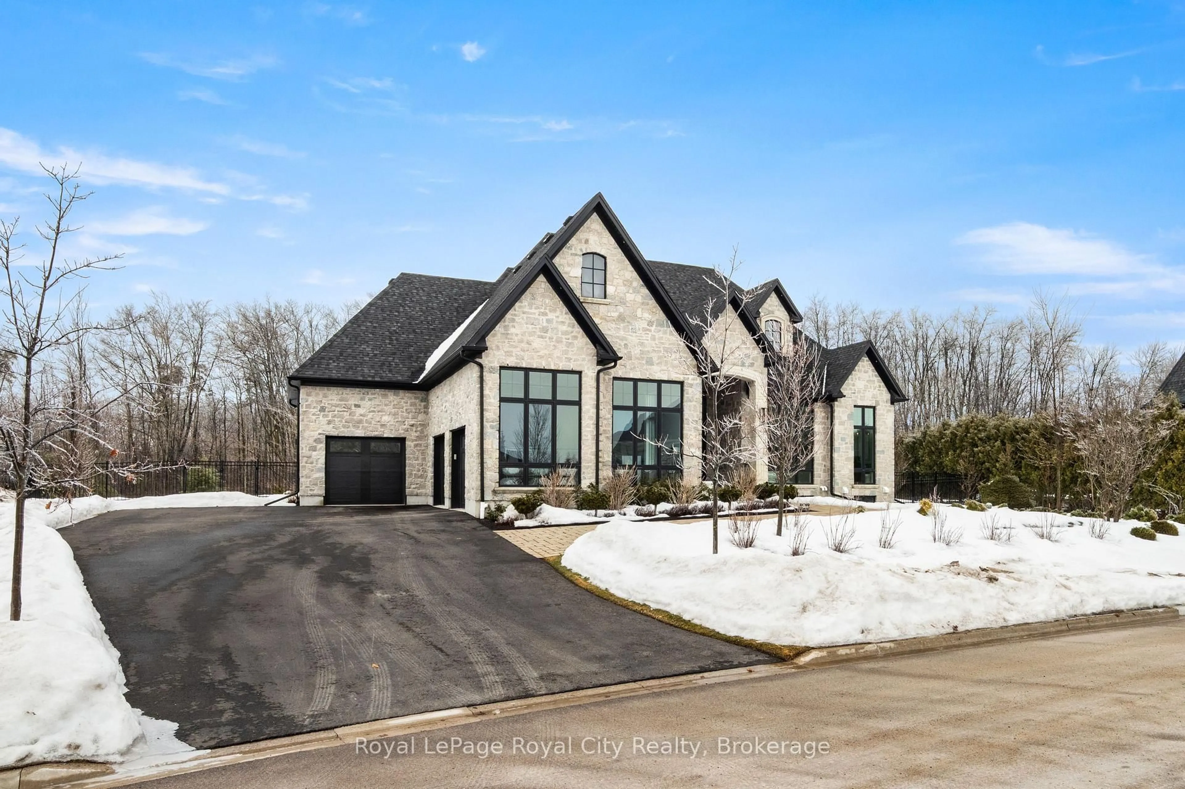 Home with brick exterior material, street for 153 Heritage Lake Dr, Puslinch Ontario N0B 2J0