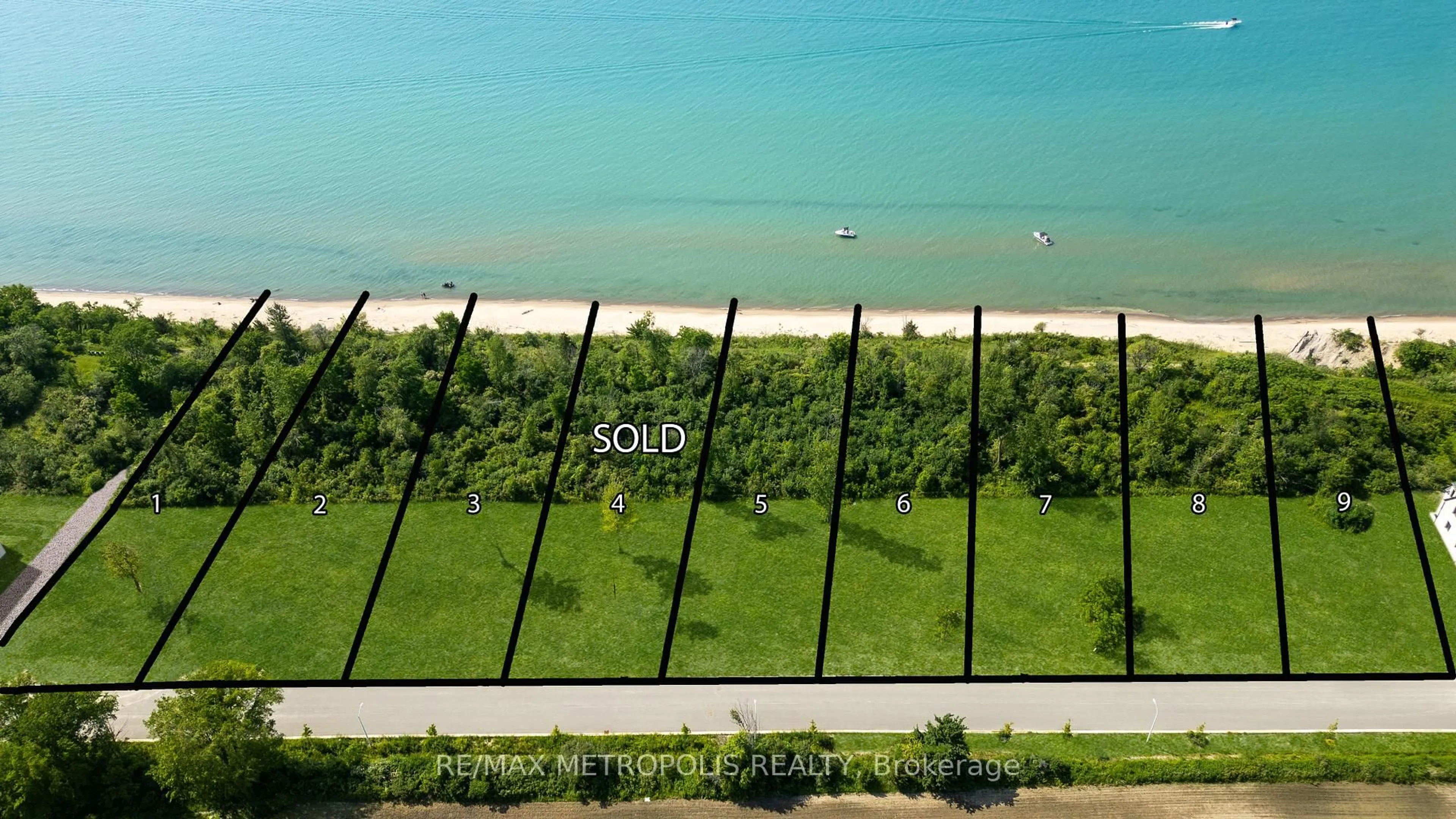 A pic from outside/outdoor area/front of a property/back of a property/a pic from drone, water/lake/river/ocean view for 7027 Blue Coast Hts, Plympton-Wyoming Ontario N0N 1E0