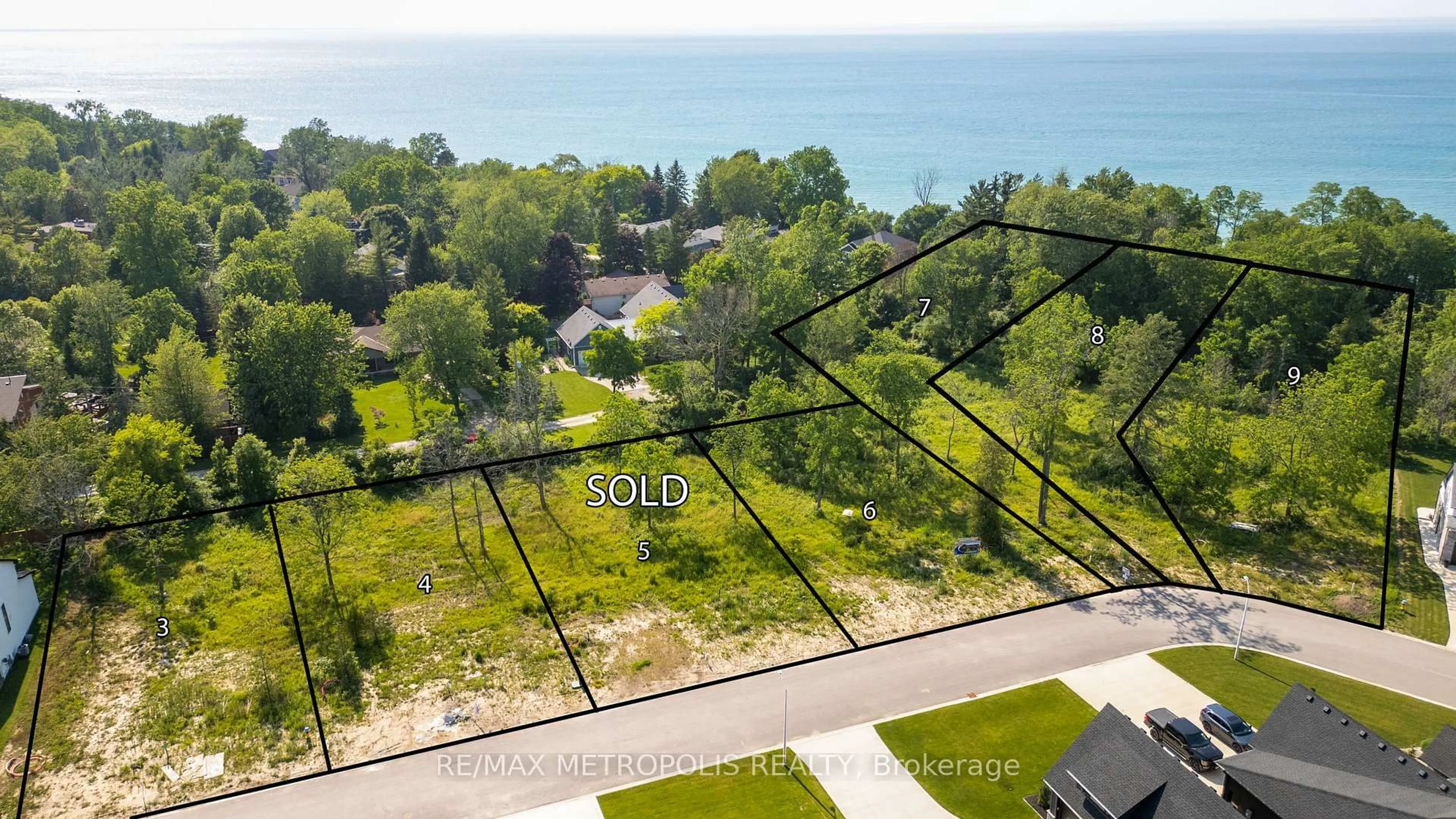 A pic from outside/outdoor area/front of a property/back of a property/a pic from drone, water/lake/river/ocean view for 7027 Blue Coast Hts, Plympton-Wyoming Ontario N0N 1E0