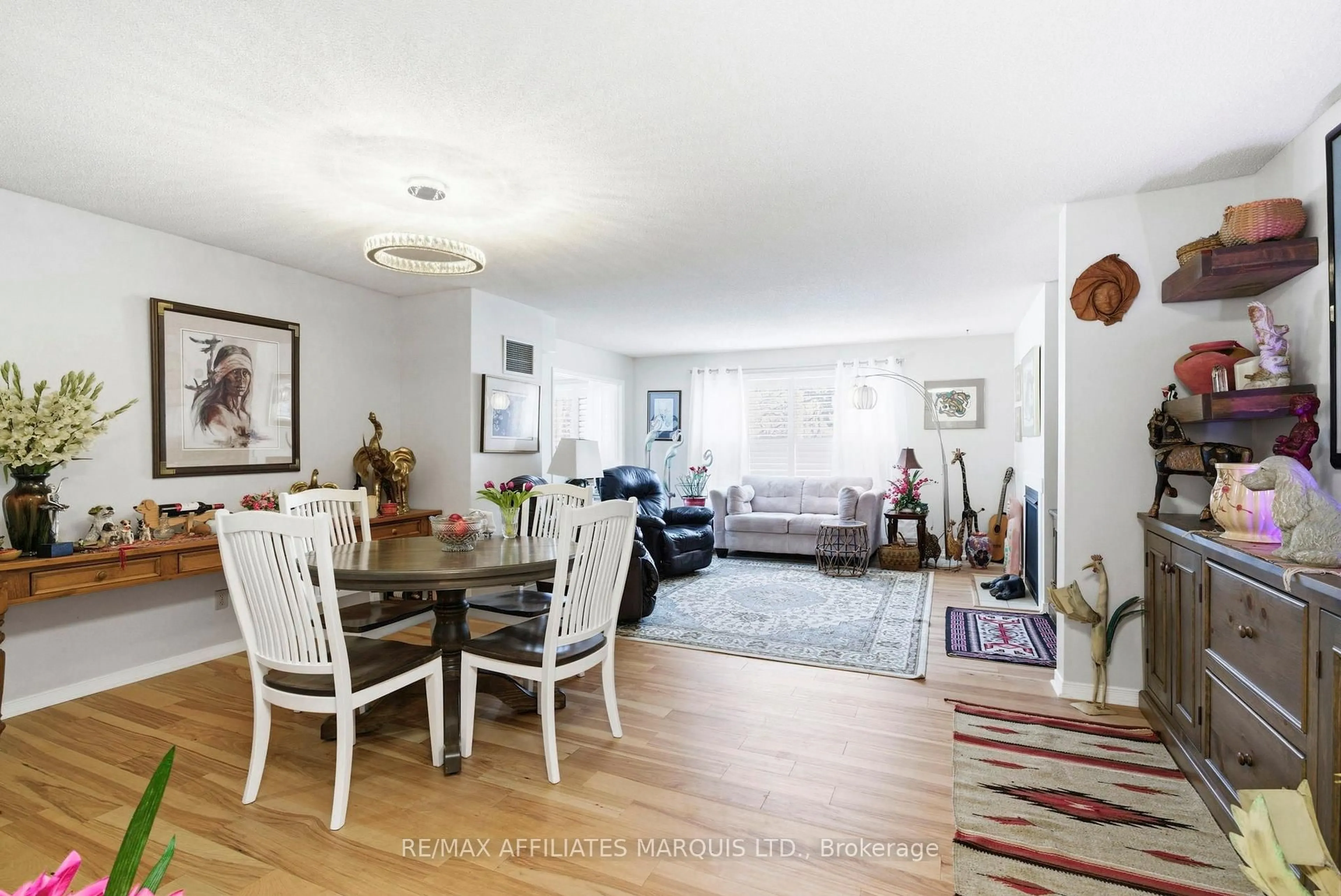 Living room with furniture, wood/laminate floor for 121 Water St #212, Cornwall Ontario K6J 5T8