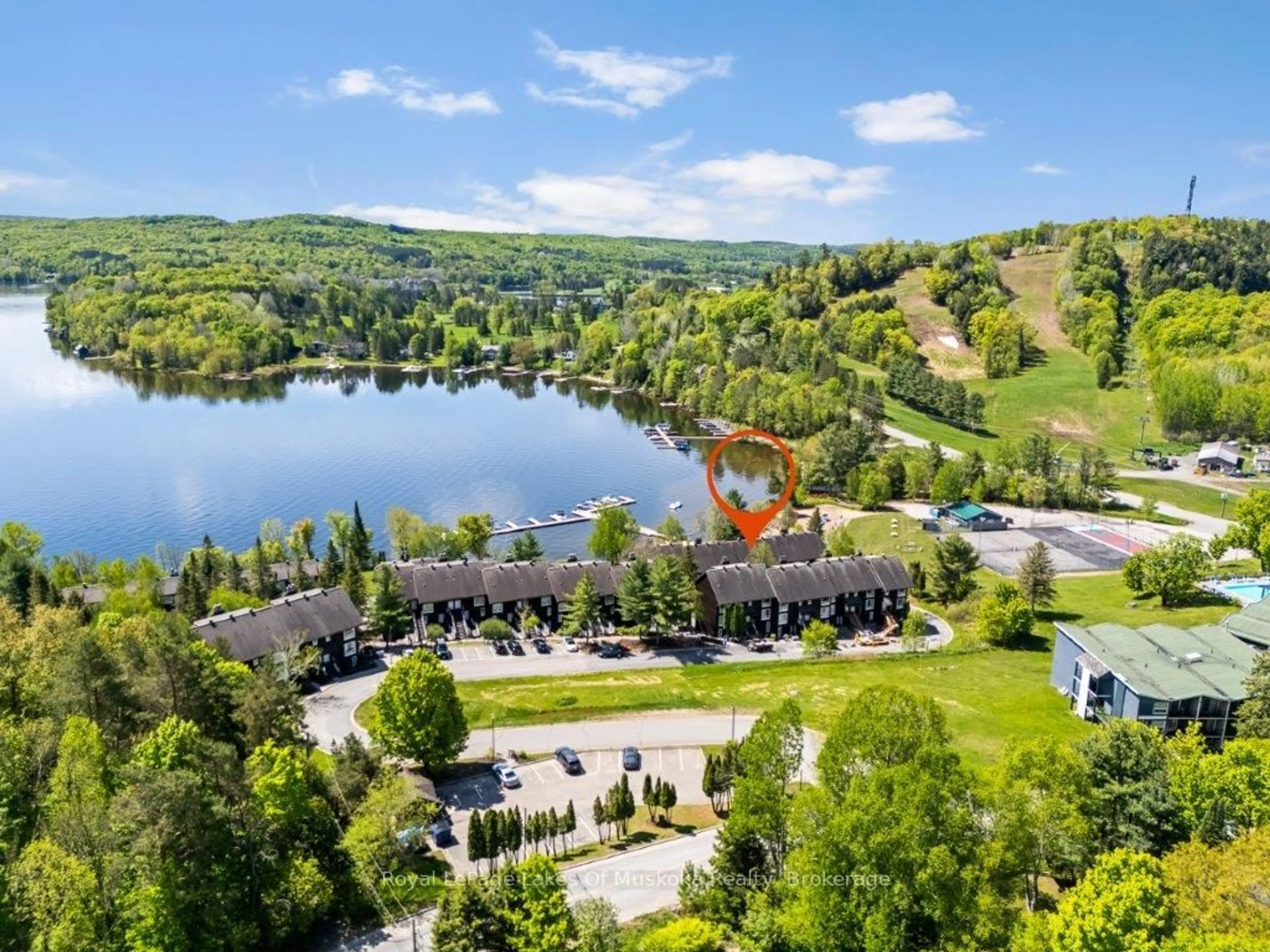 A pic from outside/outdoor area/front of a property/back of a property/a pic from drone, water/lake/river/ocean view for 30 Turner Dr, Huntsville Ontario P1H 1A8