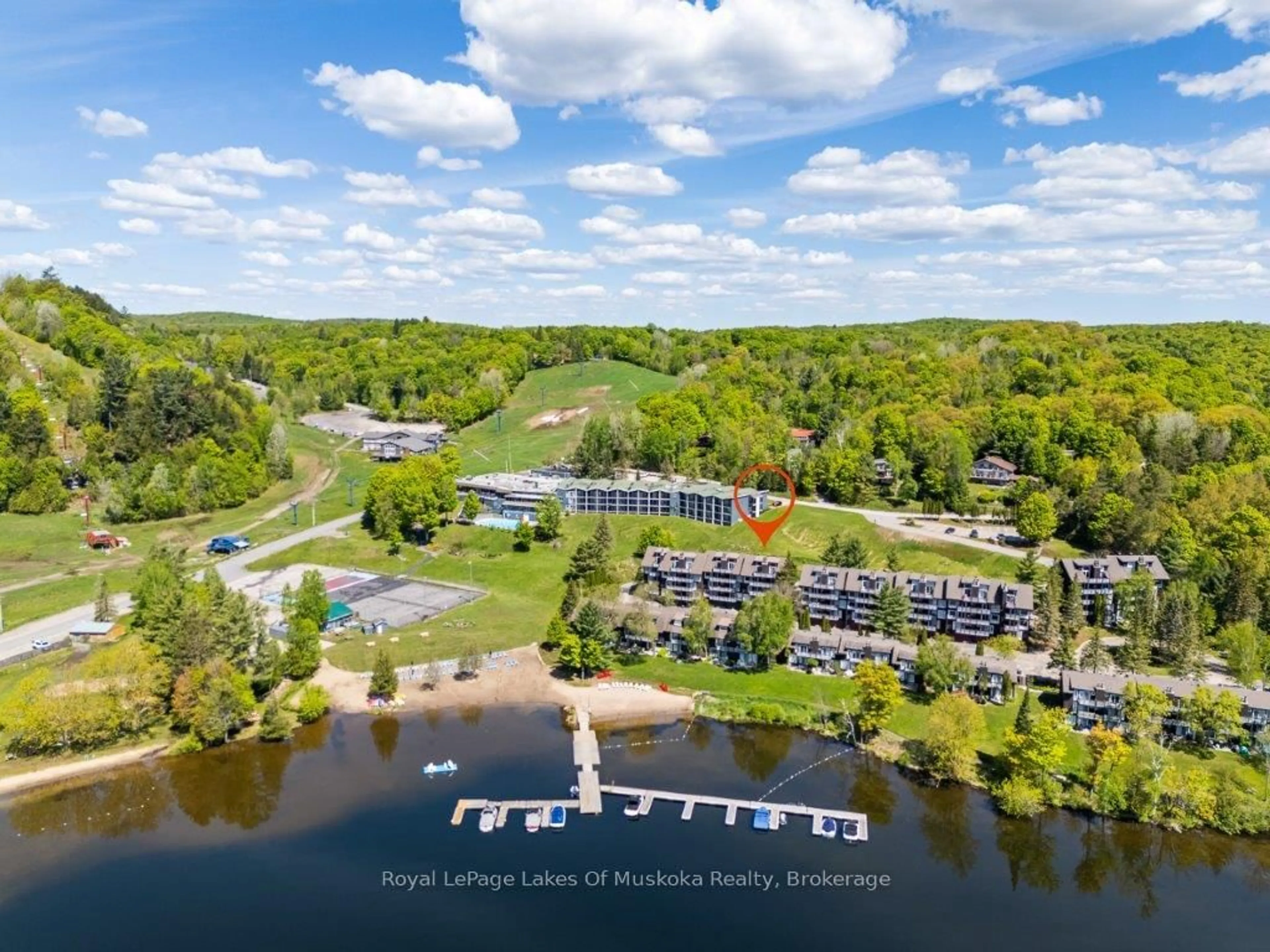 A pic from outside/outdoor area/front of a property/back of a property/a pic from drone, water/lake/river/ocean view for 30 Turner Dr, Huntsville Ontario P1H 1A8
