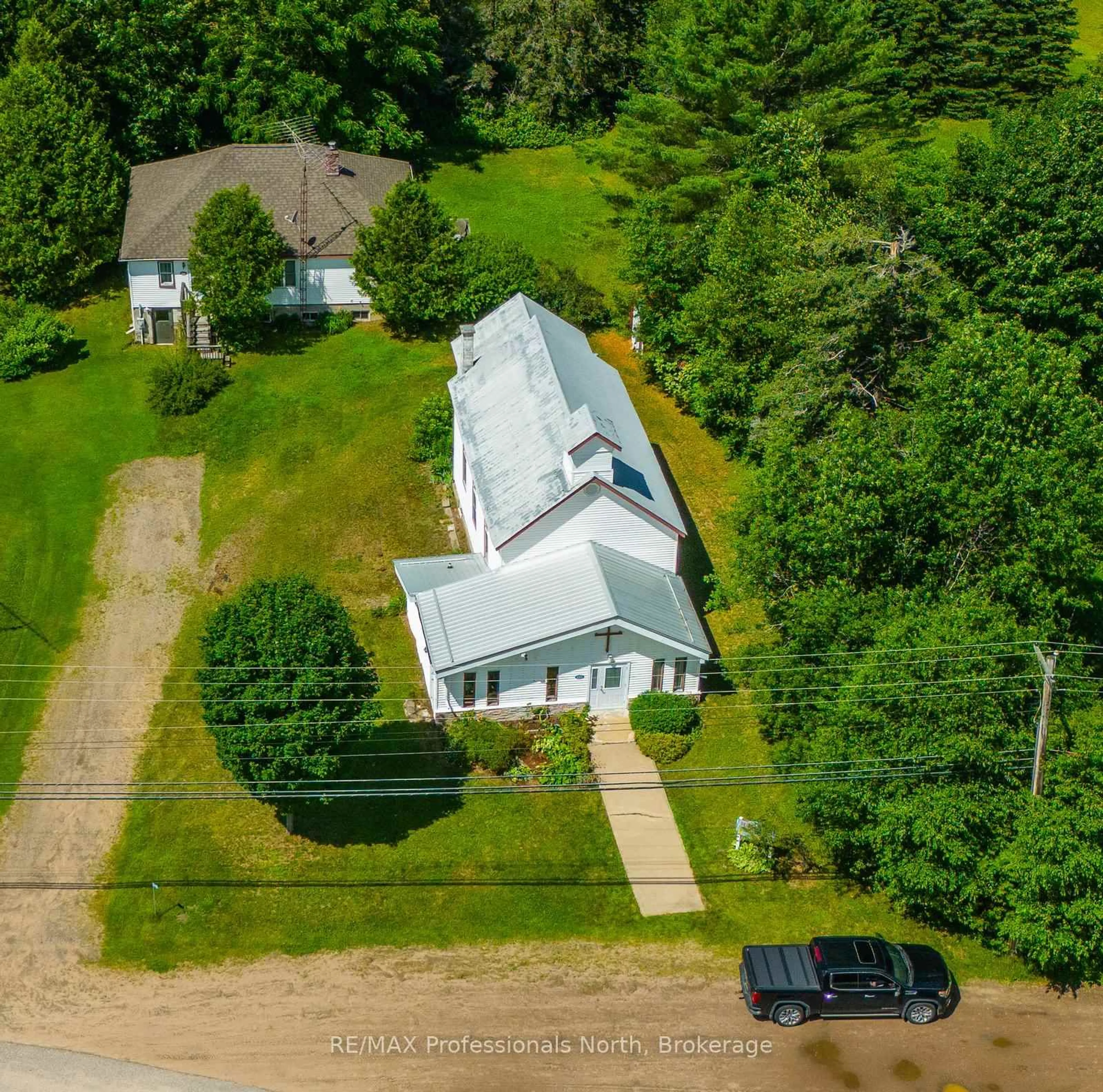 A pic from outside/outdoor area/front of a property/back of a property/a pic from drone, street for 2319 Loop Rd, Highlands East Ontario K0L 3C0