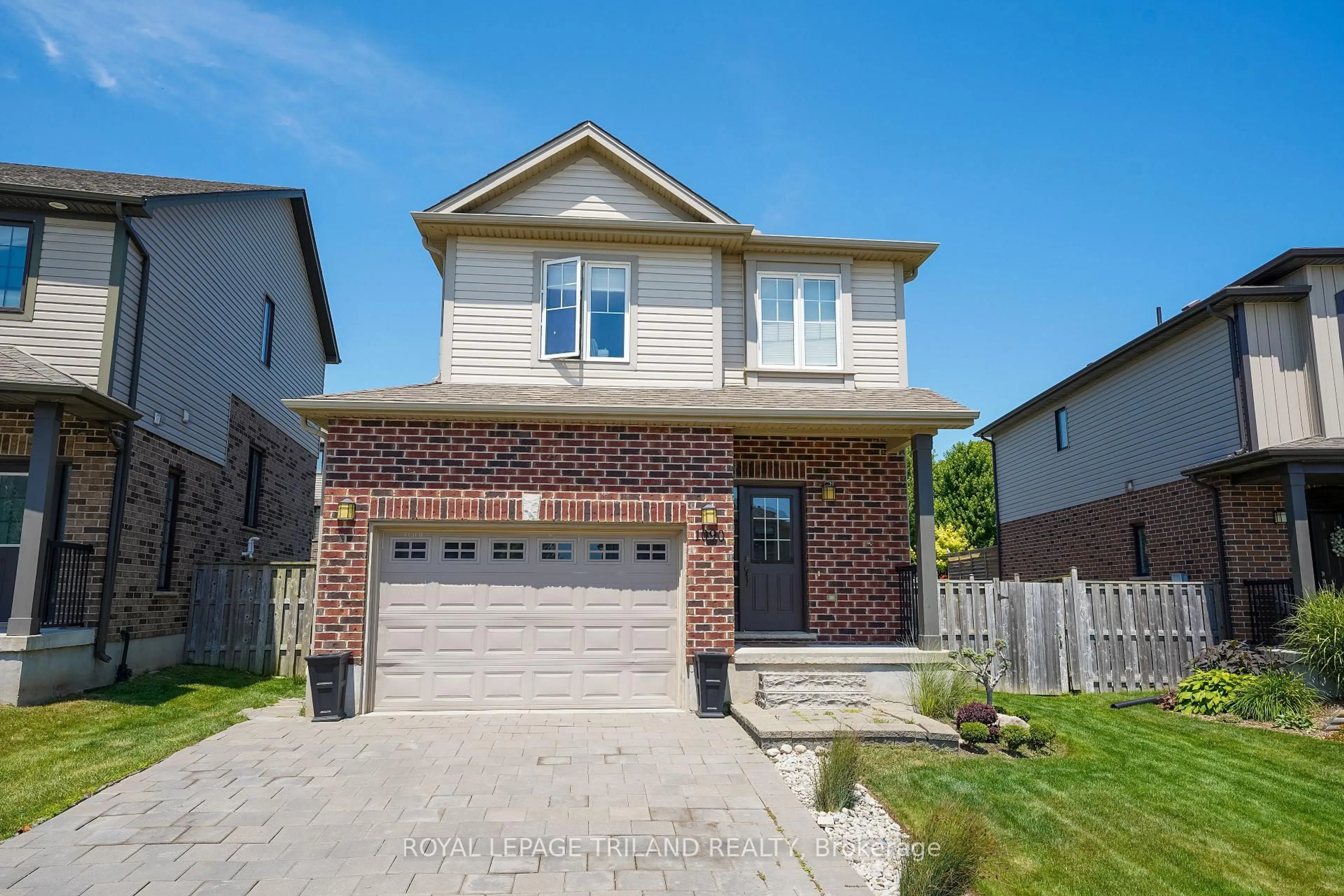 Home with brick exterior material, street for 1090 Oakcrossing Rd, London North Ontario N6H 0E9