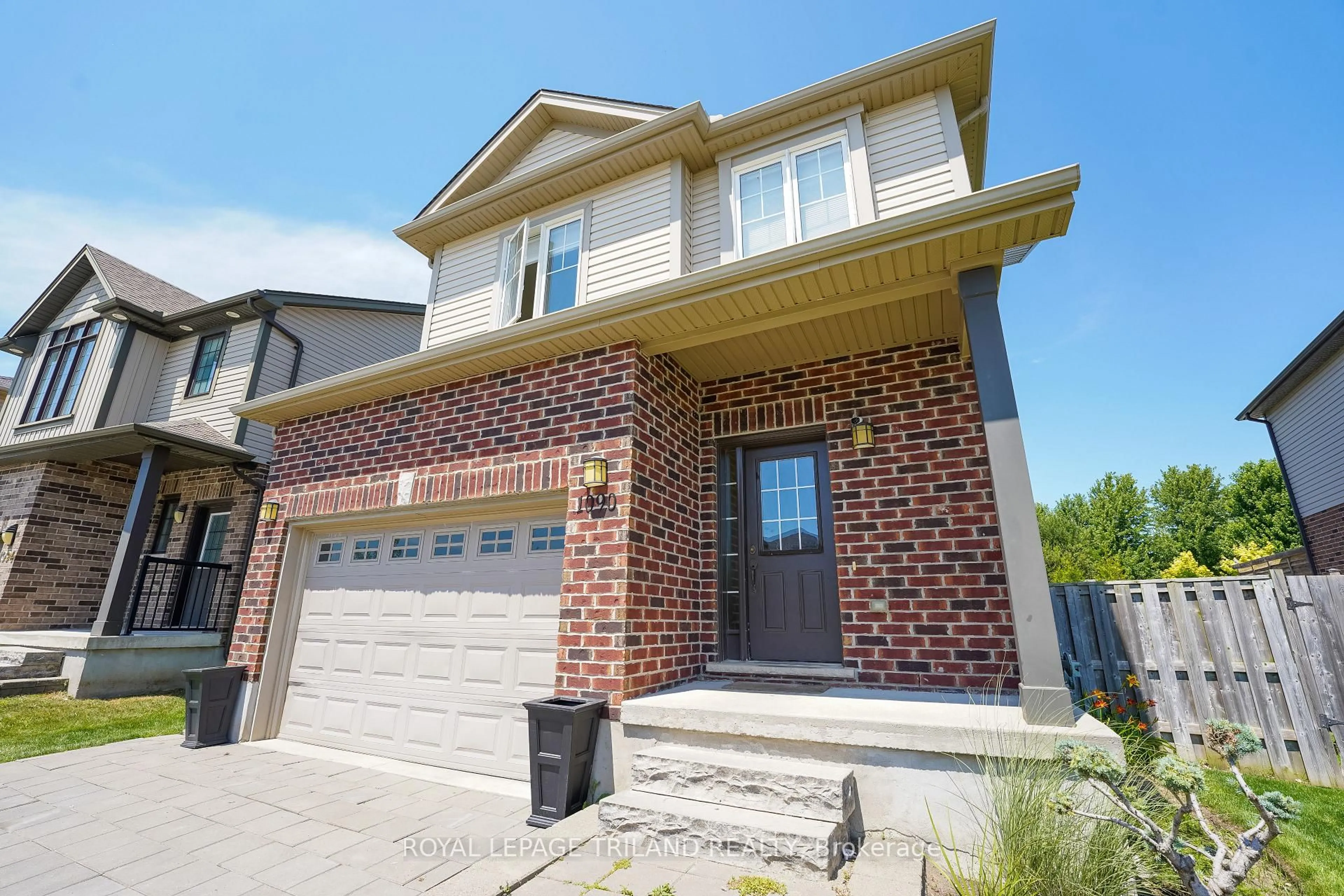 Home with brick exterior material, street for 1090 Oakcrossing Rd, London North Ontario N6H 0E9