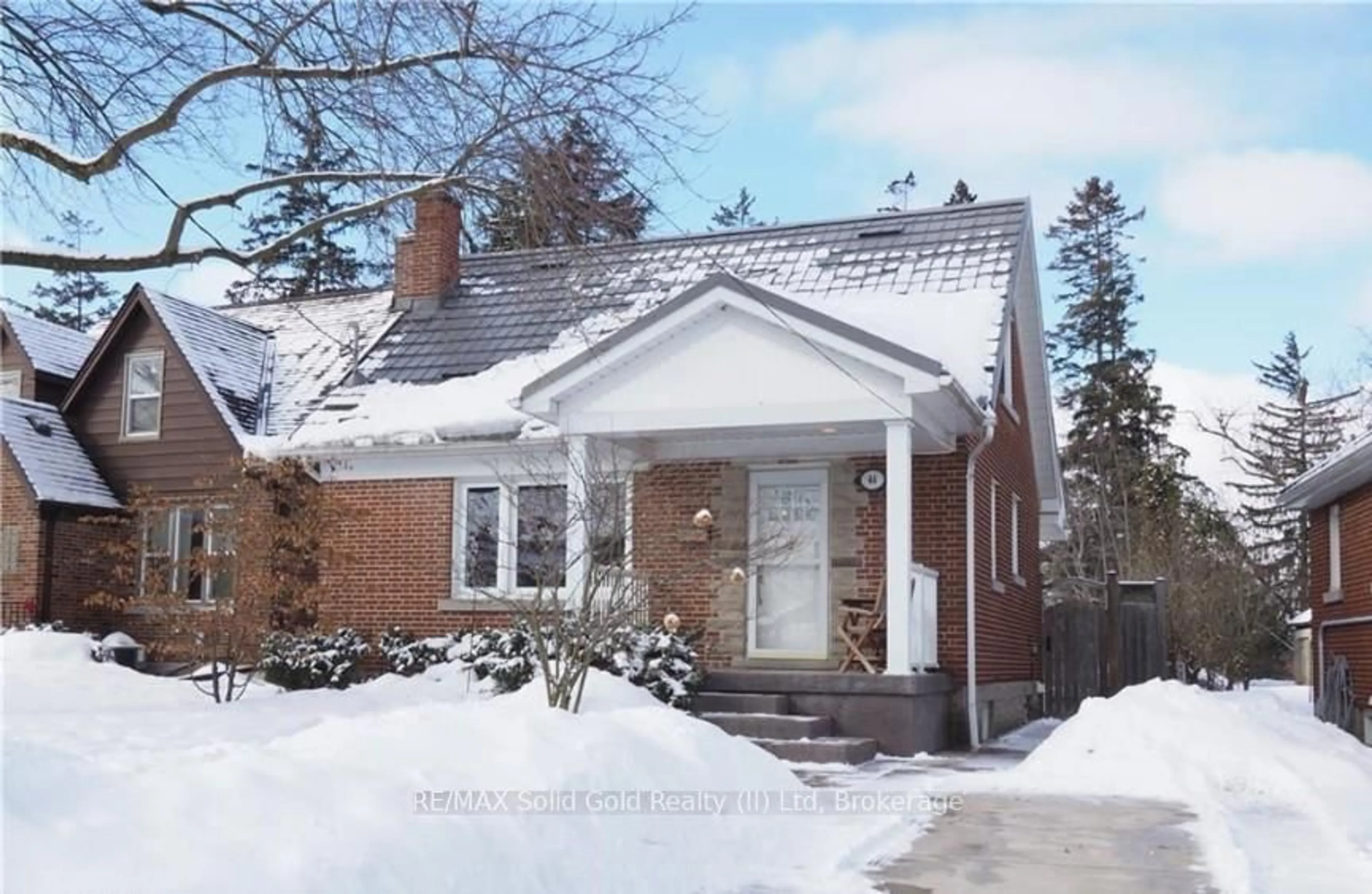 Home with brick exterior material, street for 44 Garden Ave, Kitchener Ontario N2M 1E6