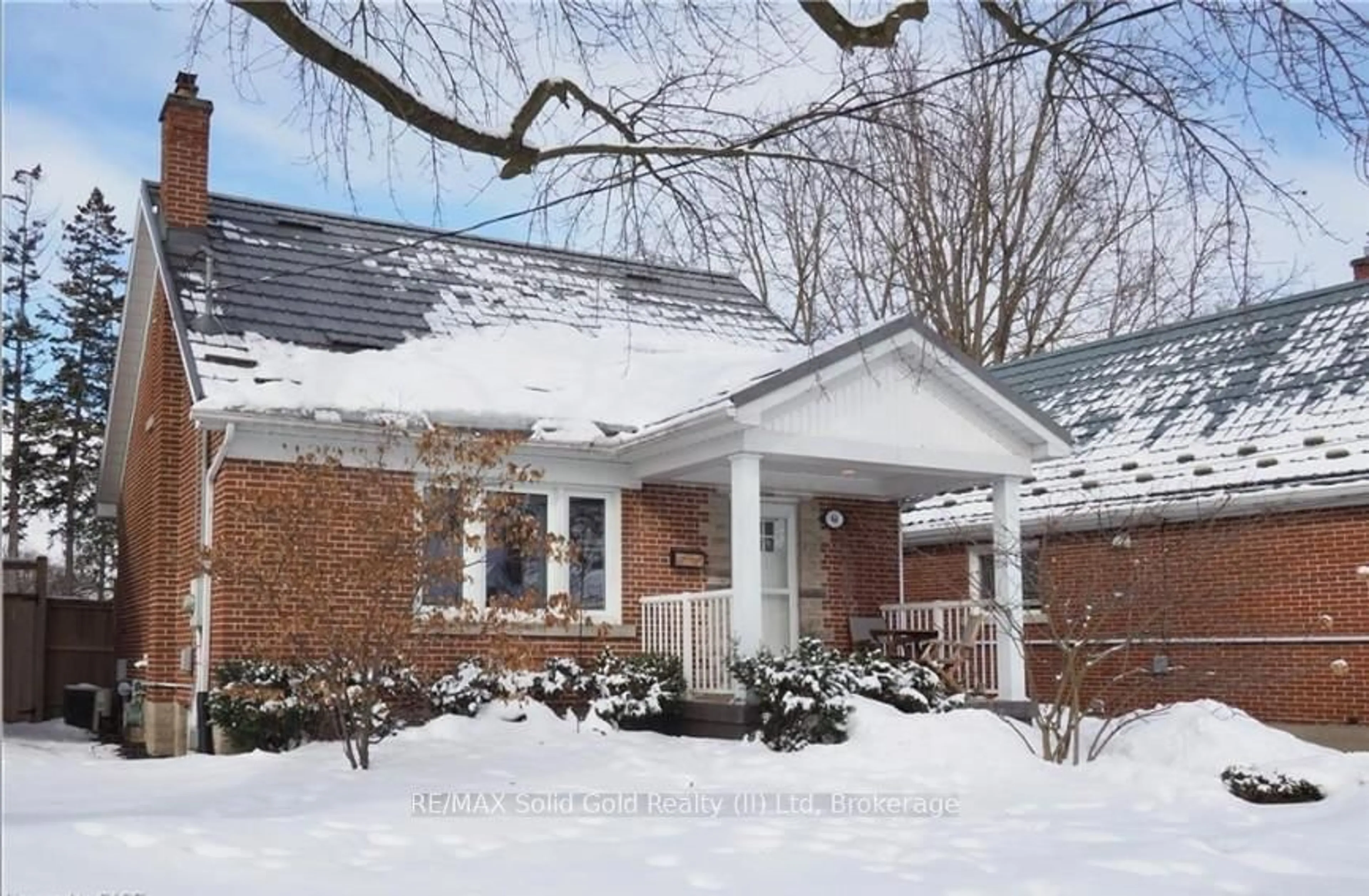 Home with brick exterior material, street for 44 Garden Ave, Kitchener Ontario N2M 1E6