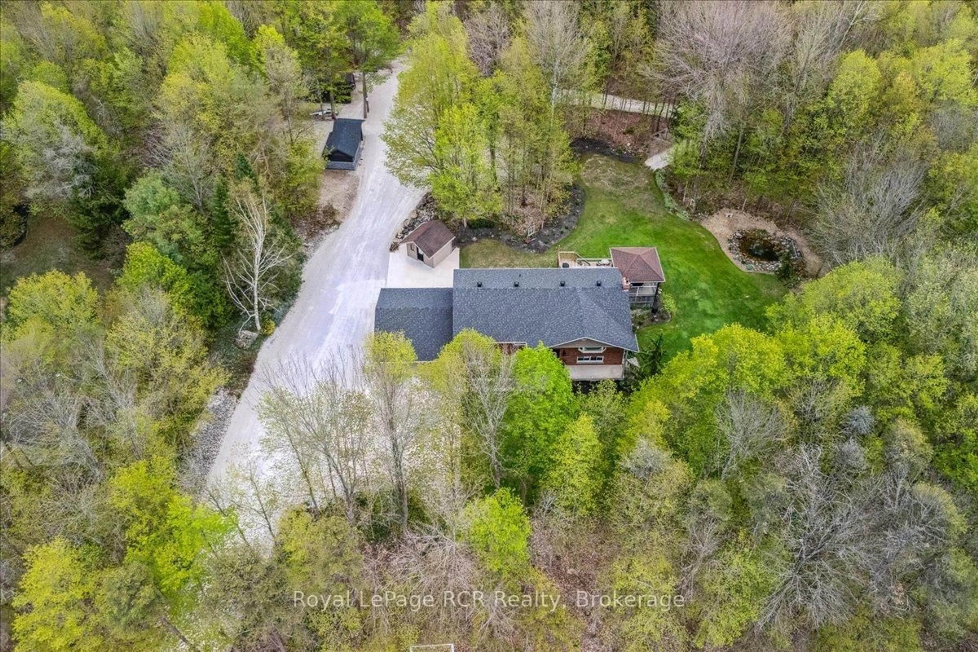 A pic from outside/outdoor area/front of a property/back of a property/a pic from drone, forest/trees view for 103488 Grey 18 Rd, Meaford Ontario N4K 5N8
