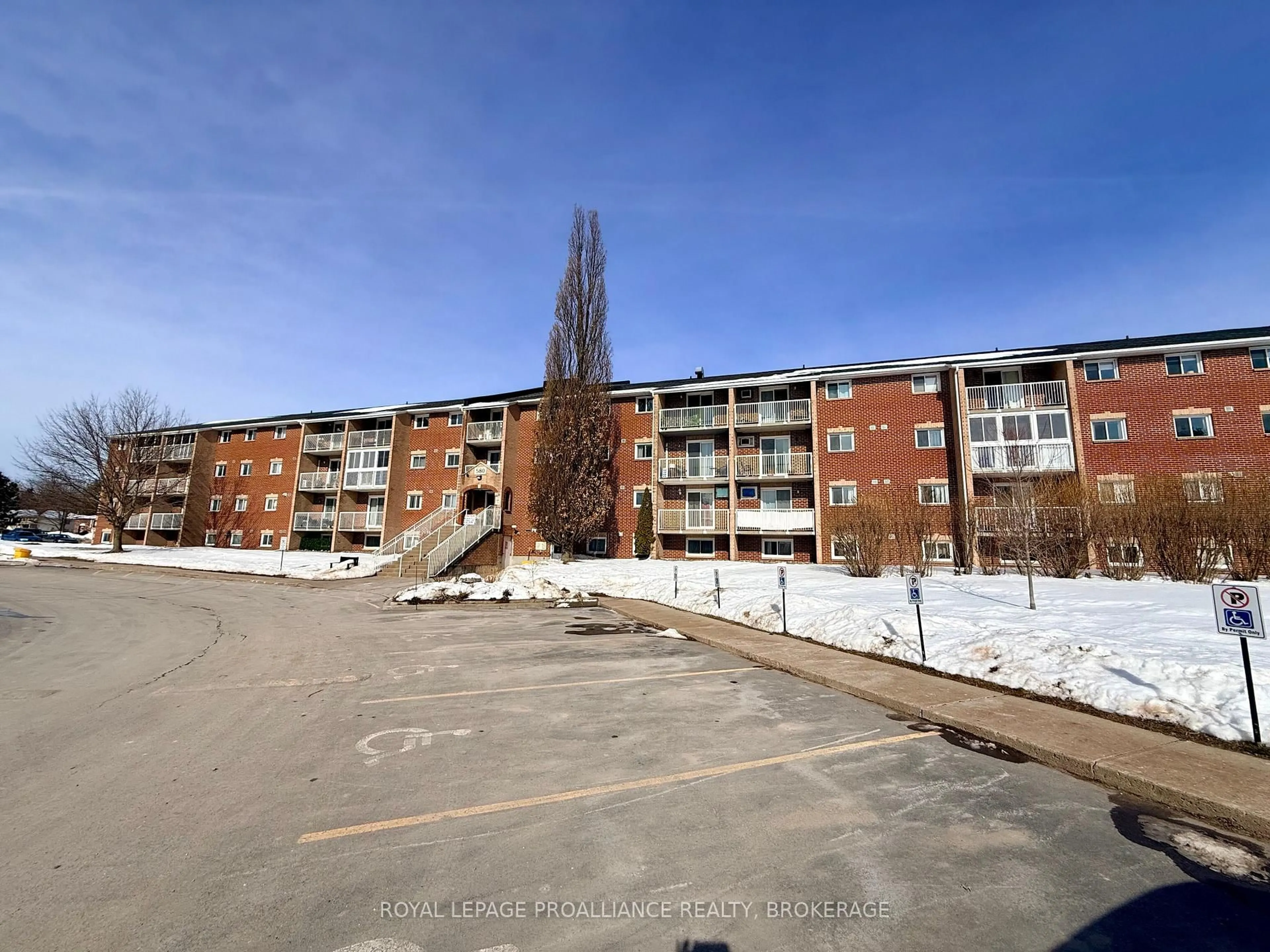 A pic from outside/outdoor area/front of a property/back of a property/a pic from drone, building for 580 Armstrong Rd #411, Kingston Ontario K7M 8M3