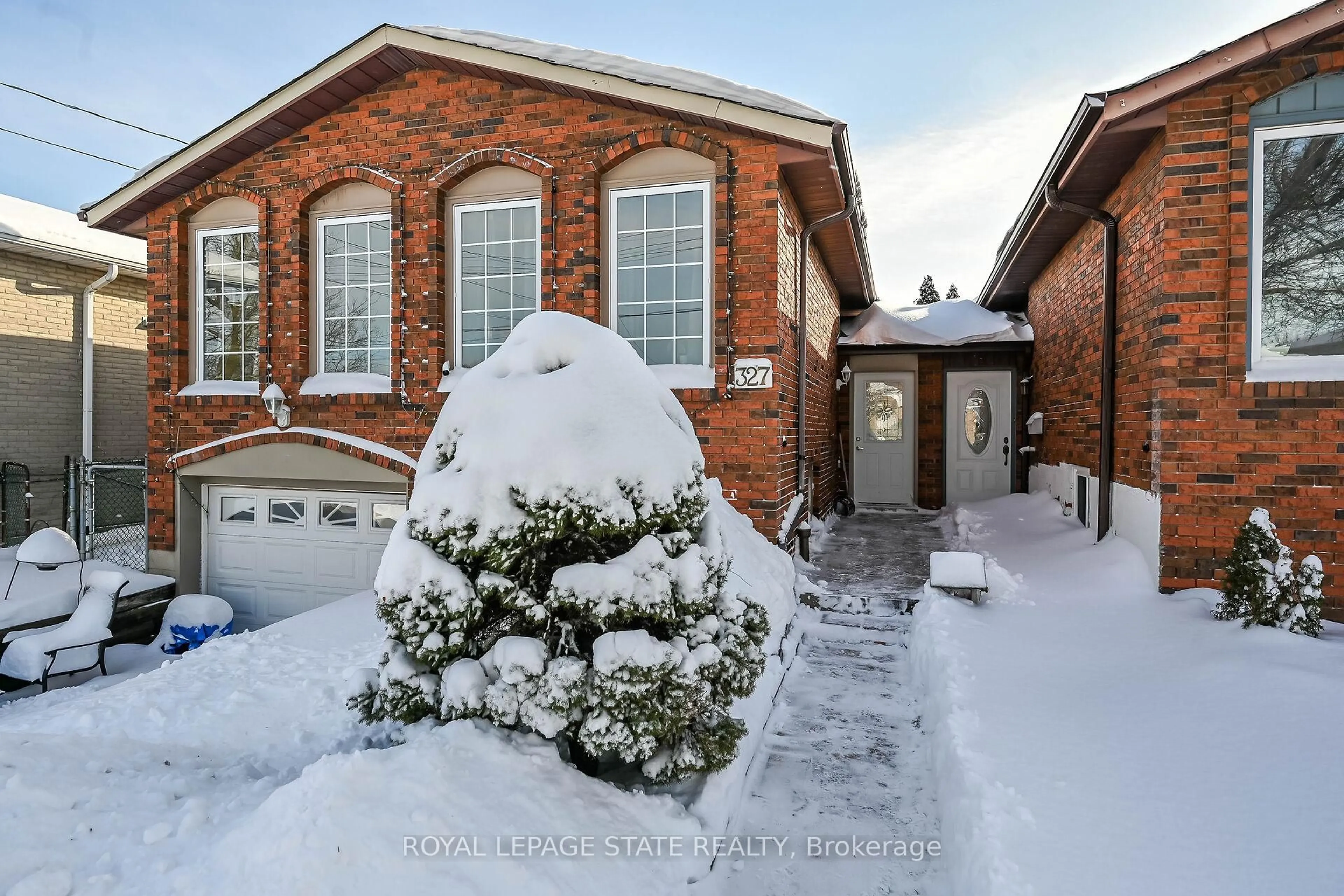 Home with brick exterior material, street for 327 Eaglewood Dr, Hamilton Ontario L8W 1Z2