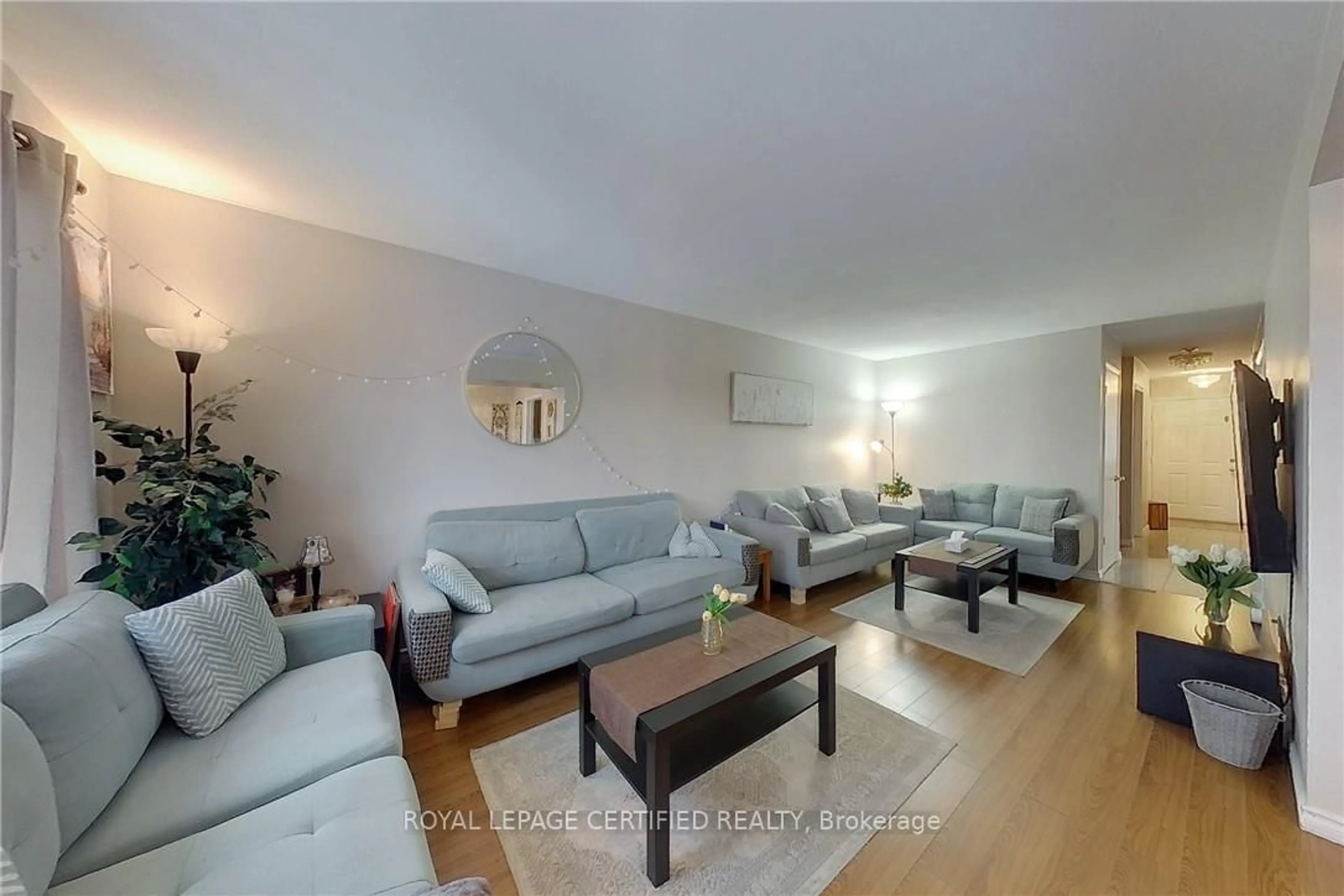 Living room with furniture, wood/laminate floor for 233 Benesfort Cres, Waterloo Ontario N2N 3B5