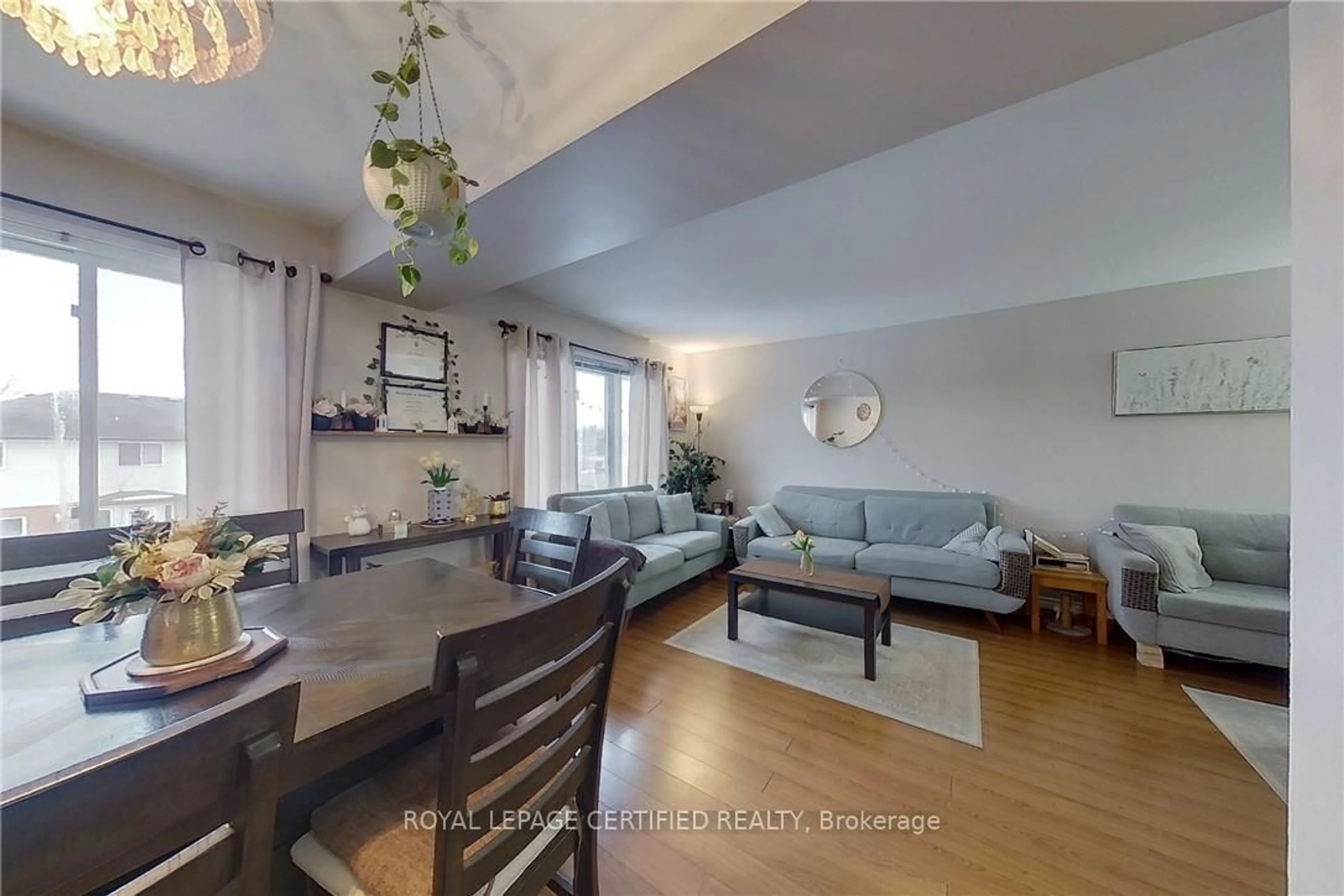 Living room with furniture, wood/laminate floor for 233 Benesfort Cres, Waterloo Ontario N2N 3B5