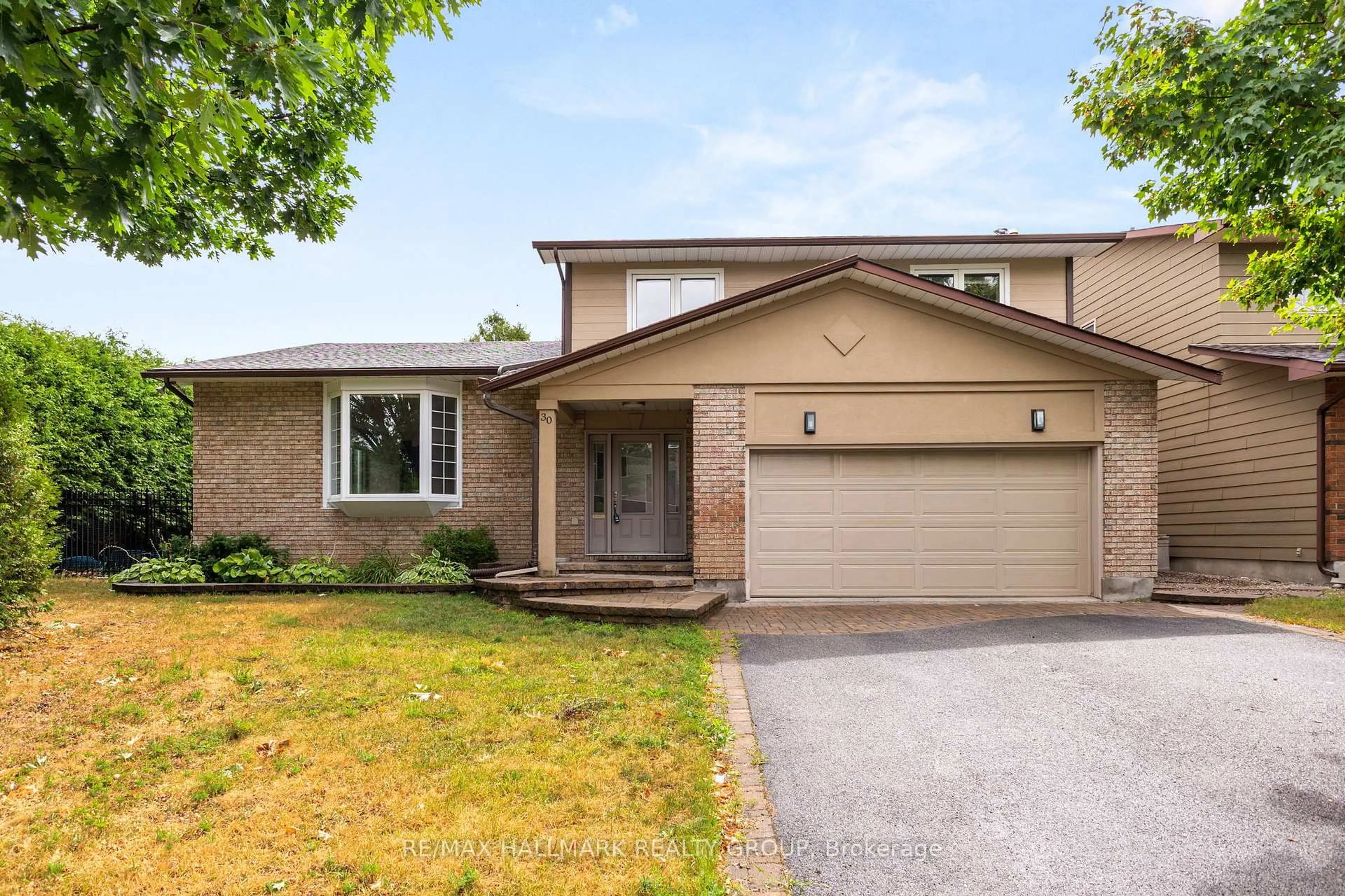 Home with brick exterior material, street for 30 Lillico Dr, Ottawa Ontario K1V 9L6