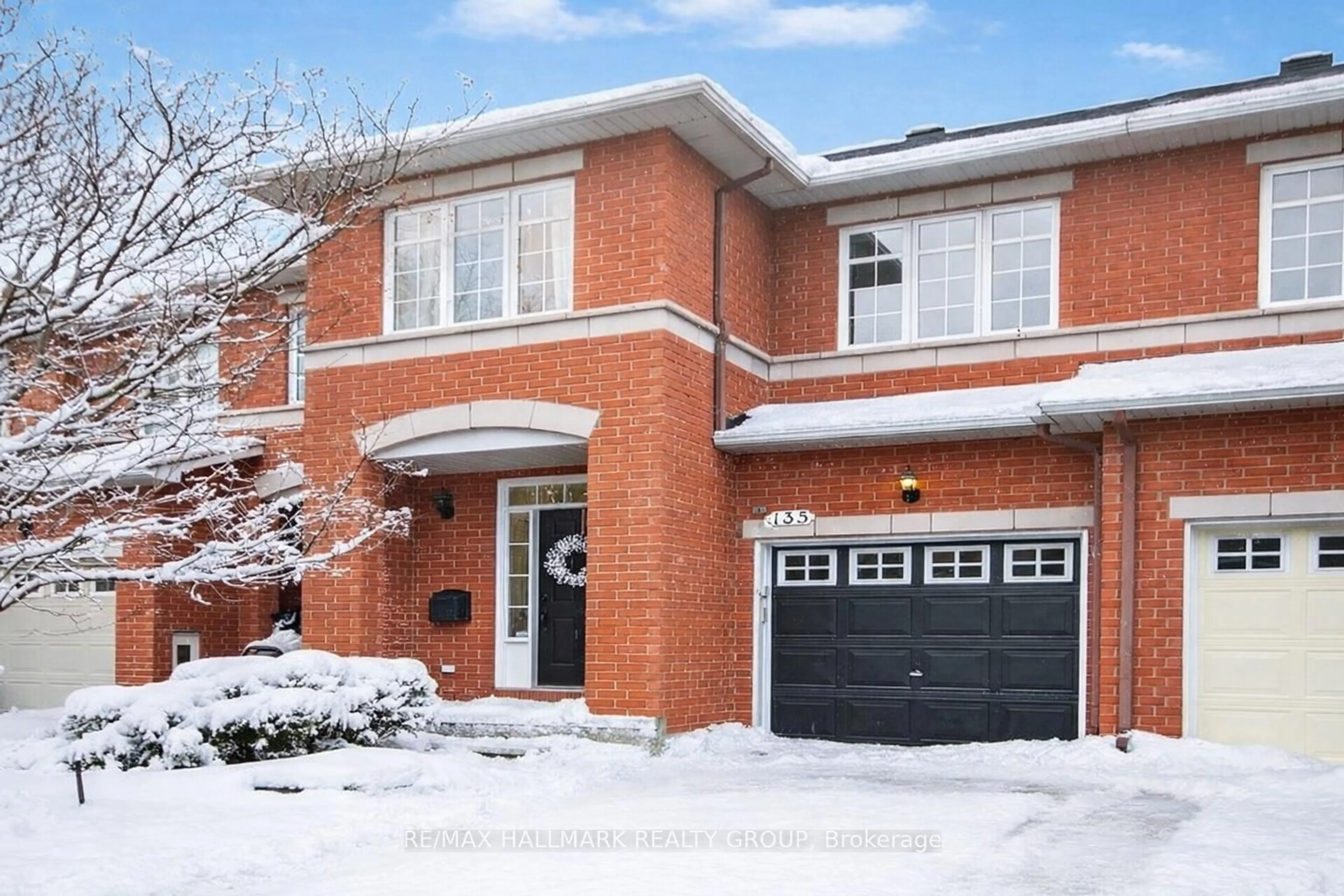 Home with brick exterior material, street for 135 Gatespark Private, Ottawa Ontario K2T 1L1