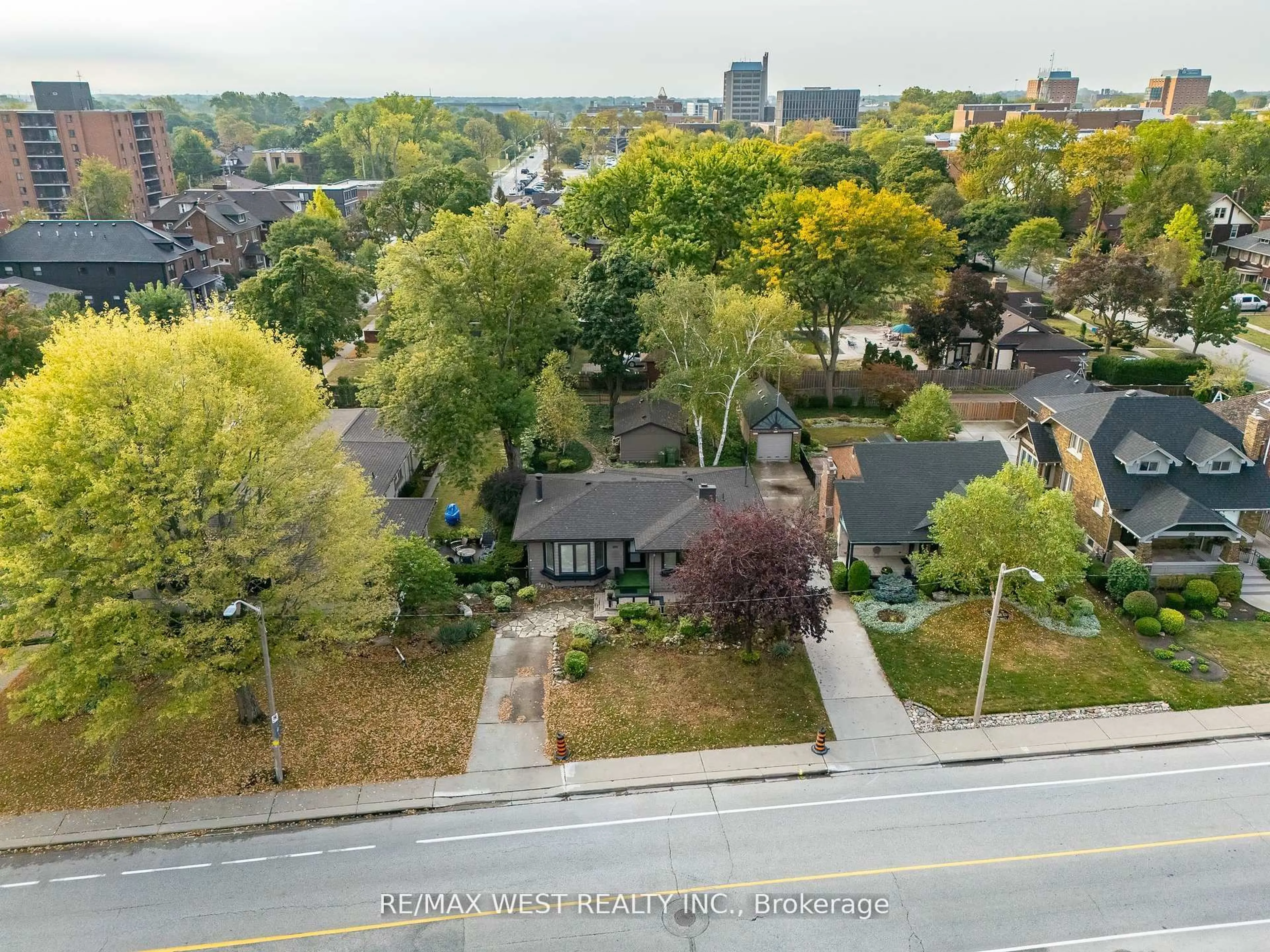 A pic from outside/outdoor area/front of a property/back of a property/a pic from drone, street for 2437 Riverside Dr, Windsor Ontario N9B 1B2