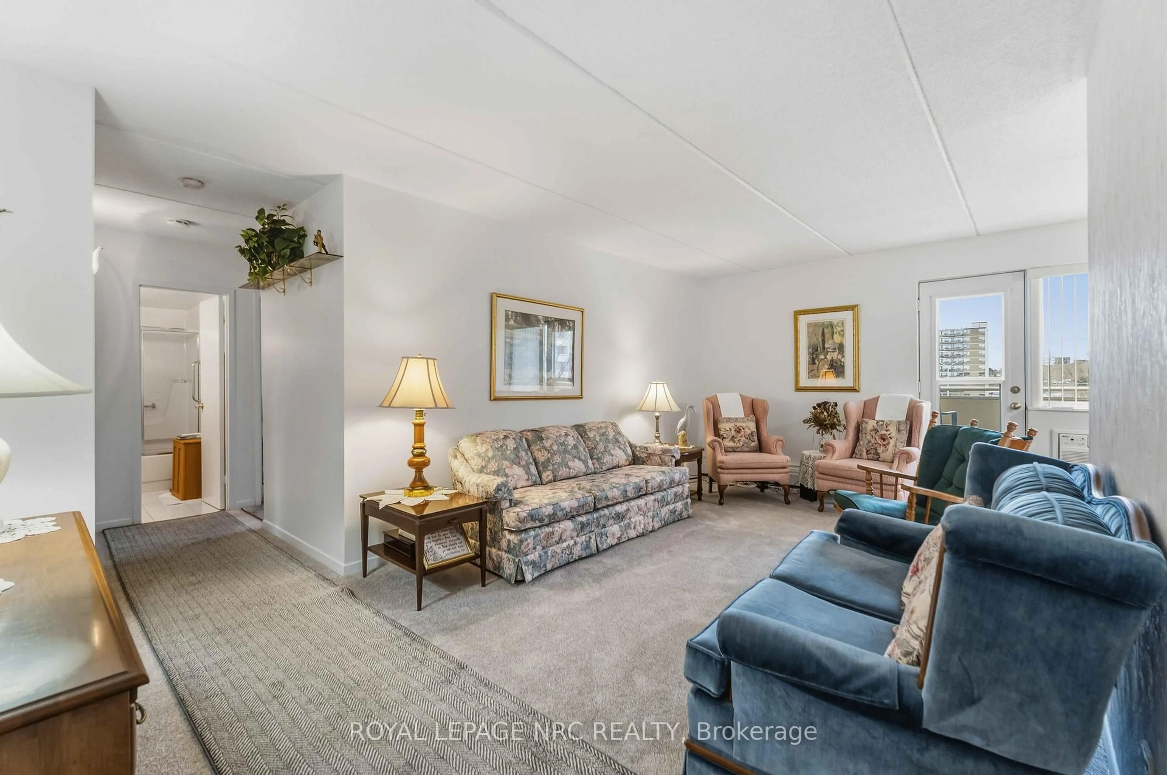 Living room with furniture, unknown for 198 Scott St #418, St. Catharines Ontario L2N 5T3