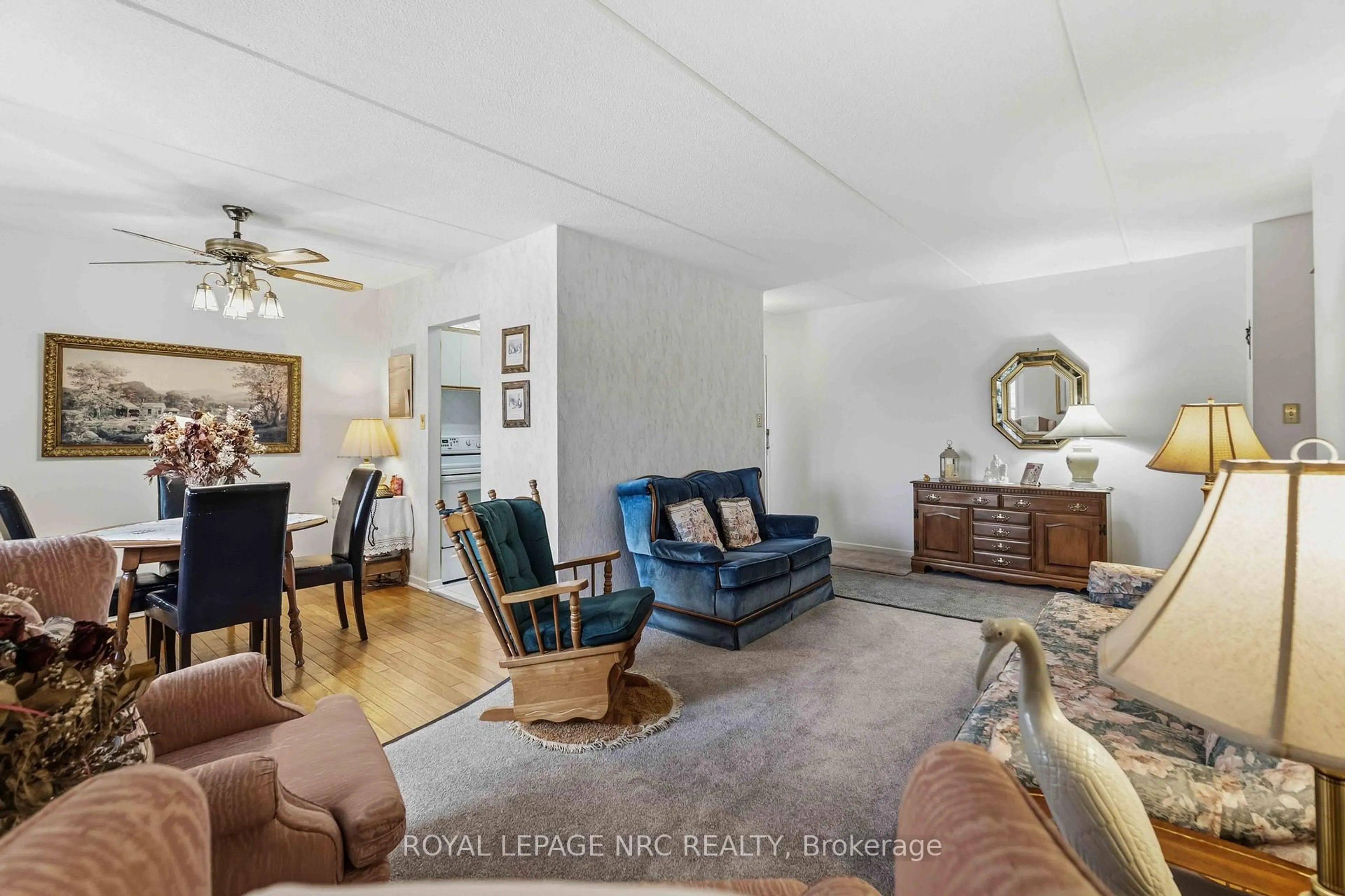 Living room with furniture, unknown for 198 Scott St #418, St. Catharines Ontario L2N 5T3