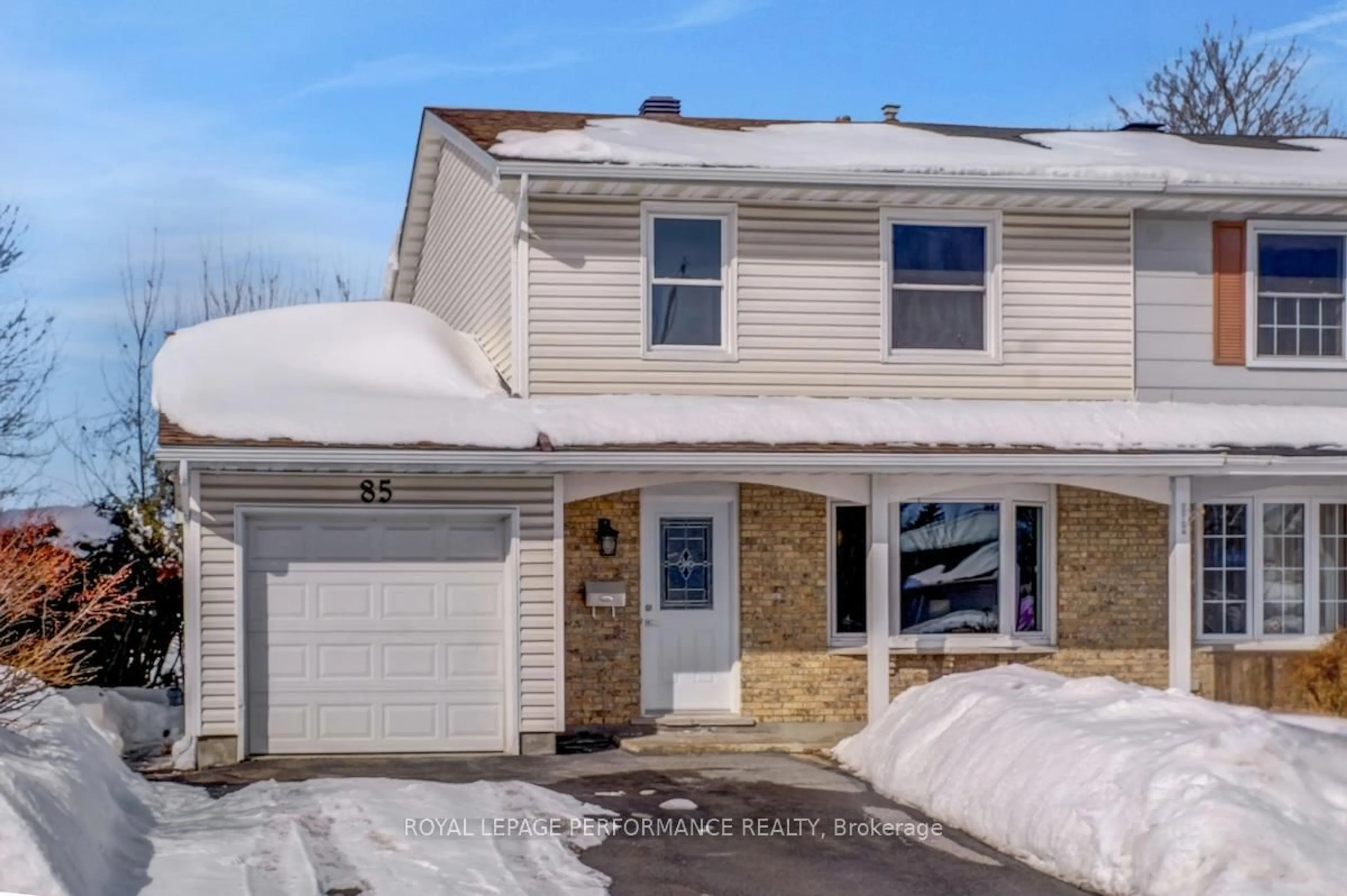 Home with vinyl exterior material, street for 85 Craig Henry Dr, Ottawa Ontario K2G 3S8