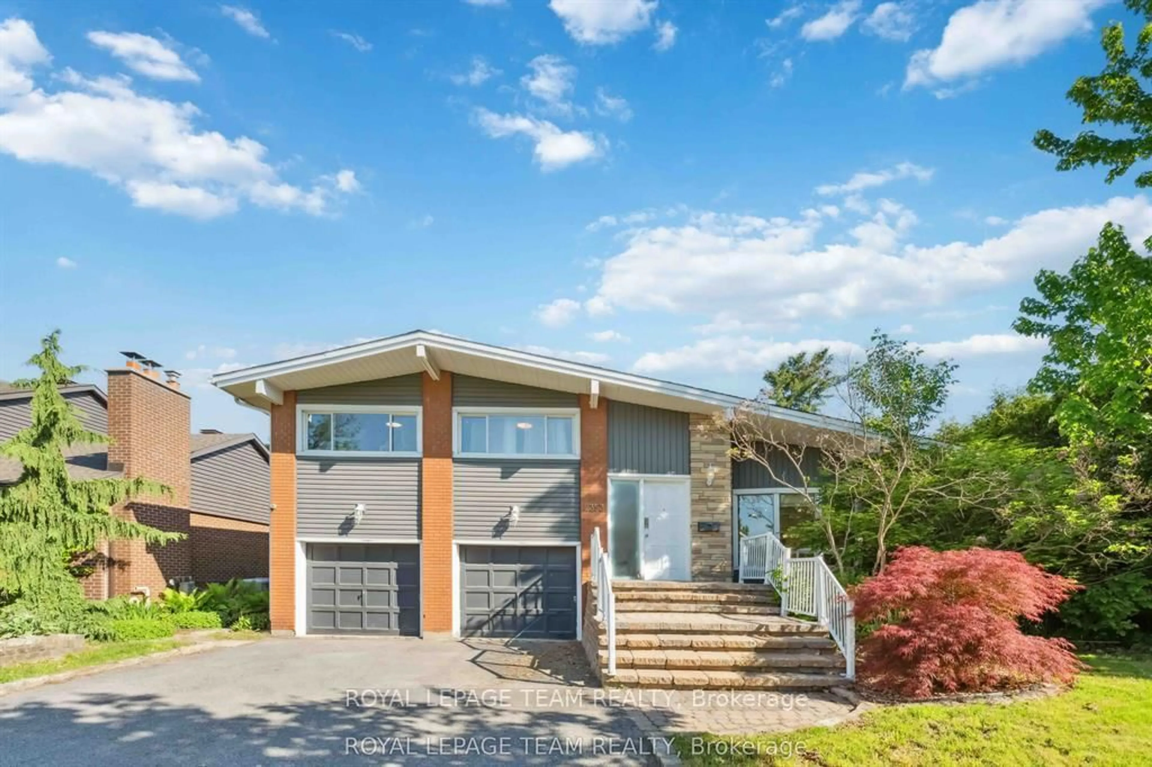 Home with vinyl exterior material, street for 2353 Georgina Dr, Ottawa Ontario K2B 7M6